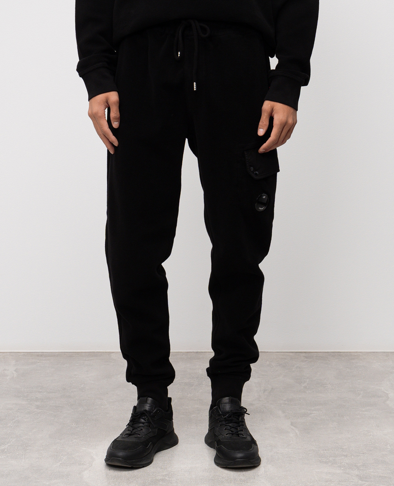 

Black joggers with logo patch C.P. Company