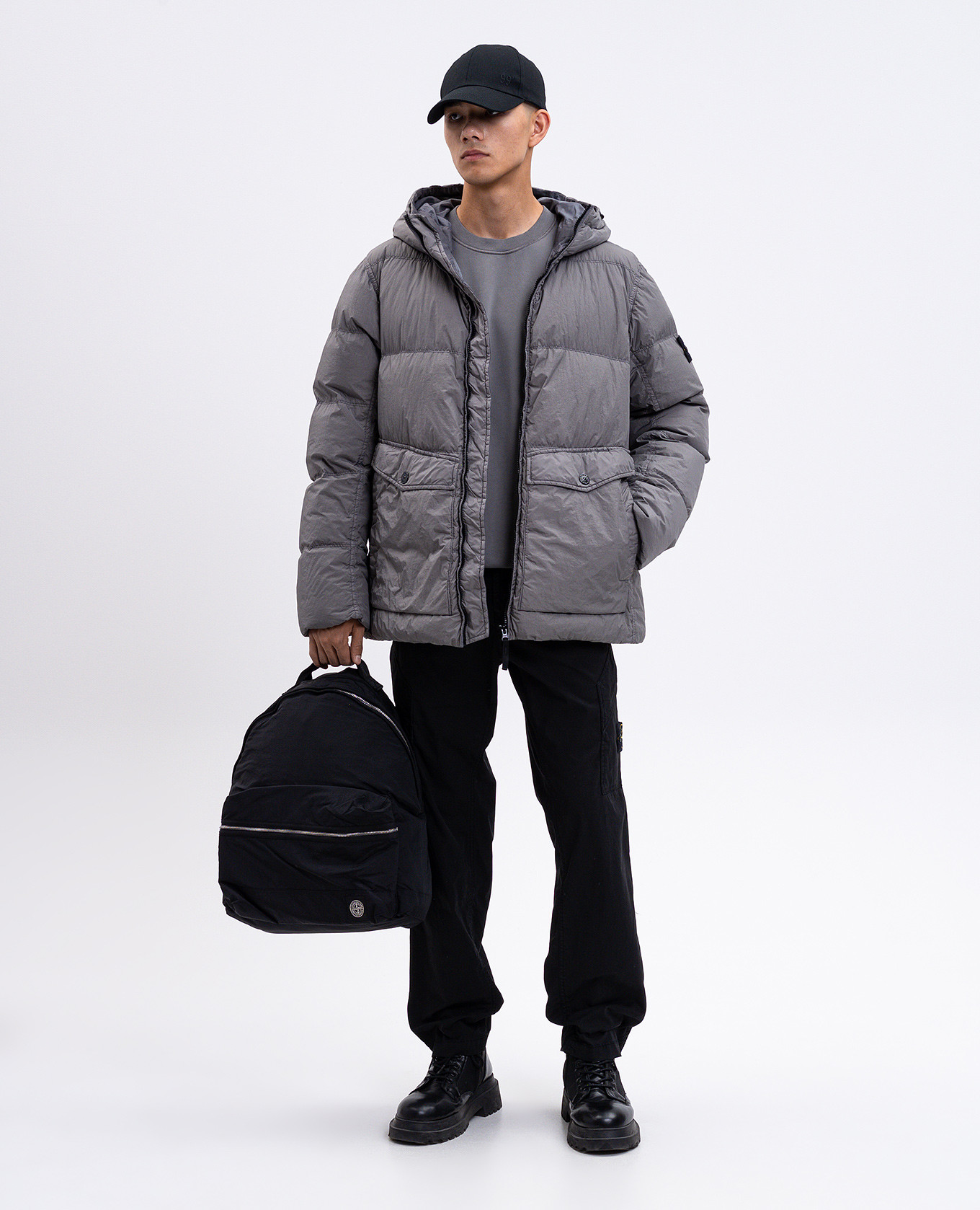 

Green down jacket with logo Stone Island
