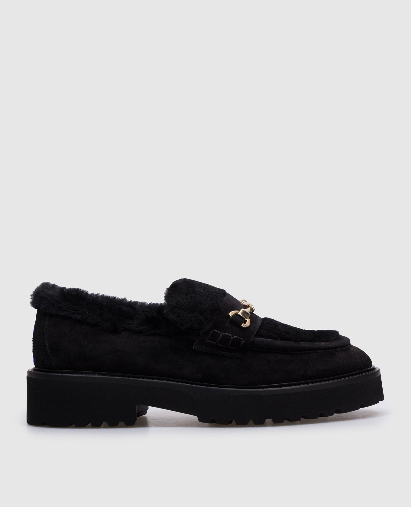 Black suede loafers on fur doucal's