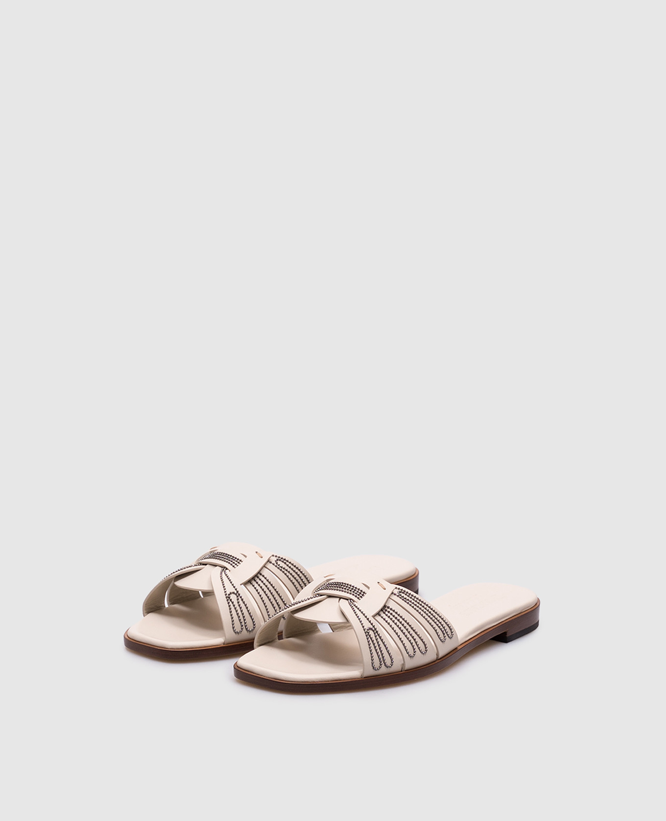 

Beige leather flip-flops with a monil chain Doucal's