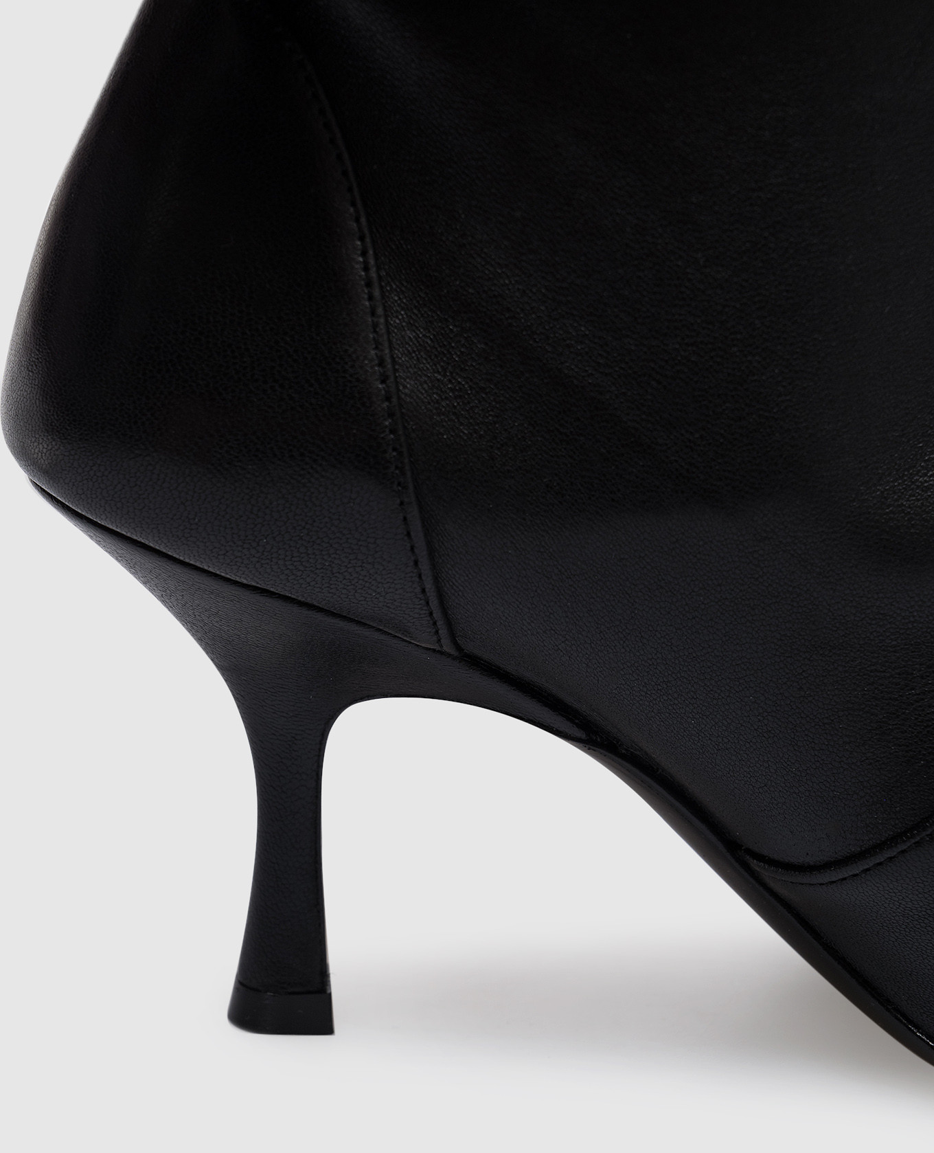

Naomi black leather boots Stuart Weitzman