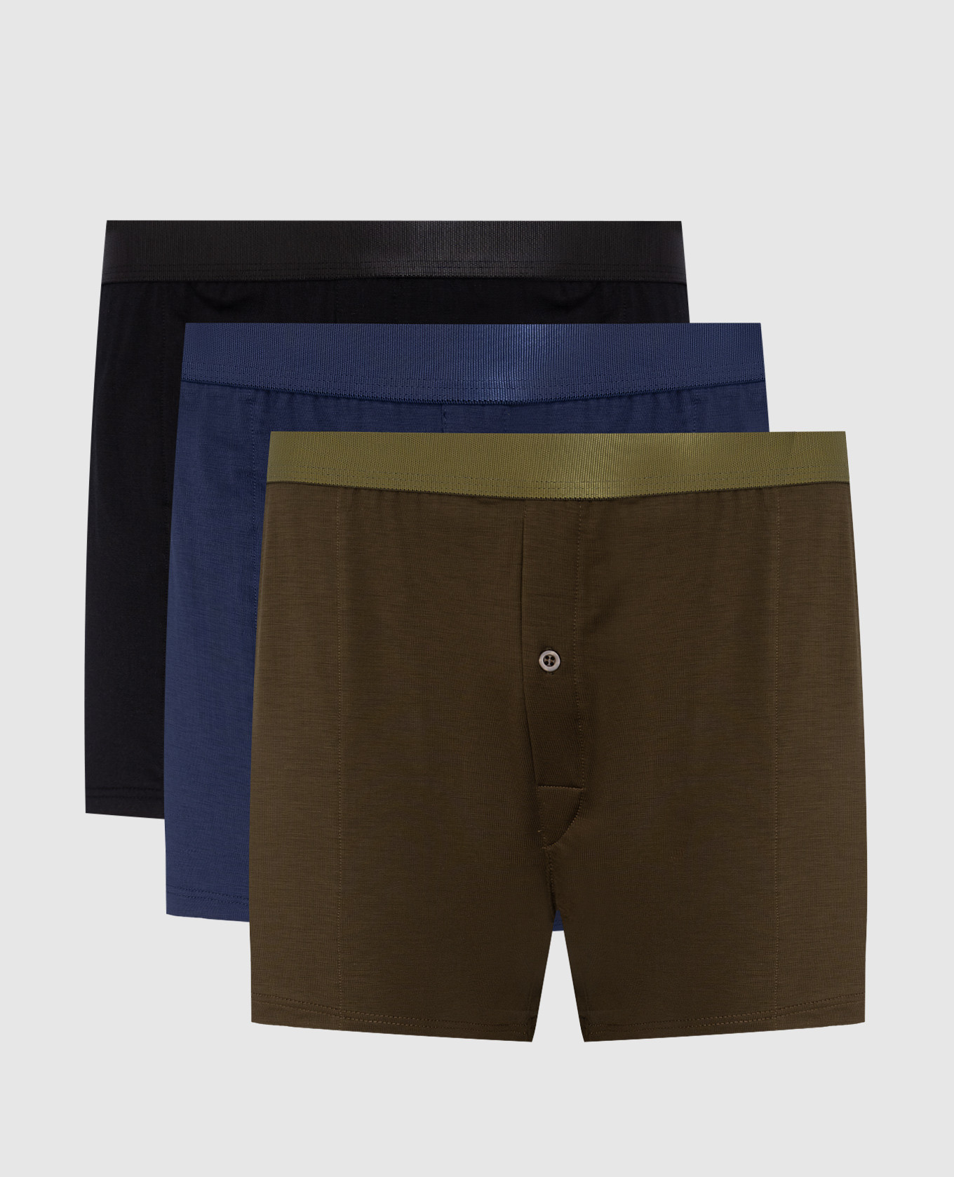 A set of boxer briefs with a woven logo pattern
