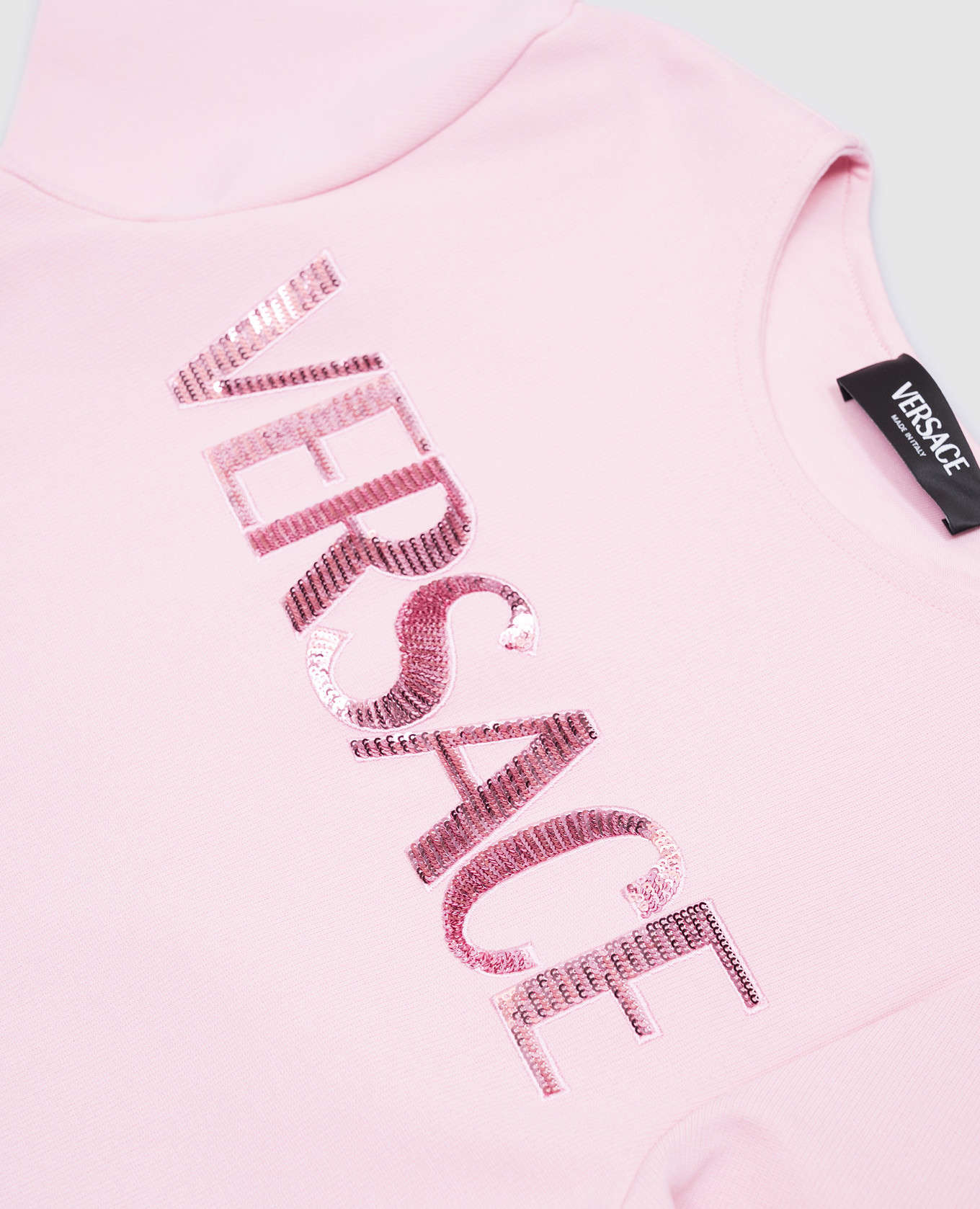 

Children's pink dress with sequin logo Versace