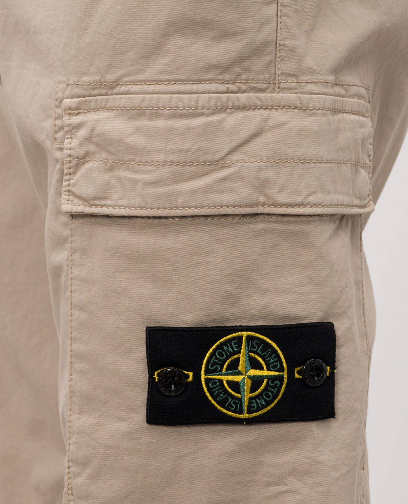 

Beige cargo pants with logo patch Stone Island