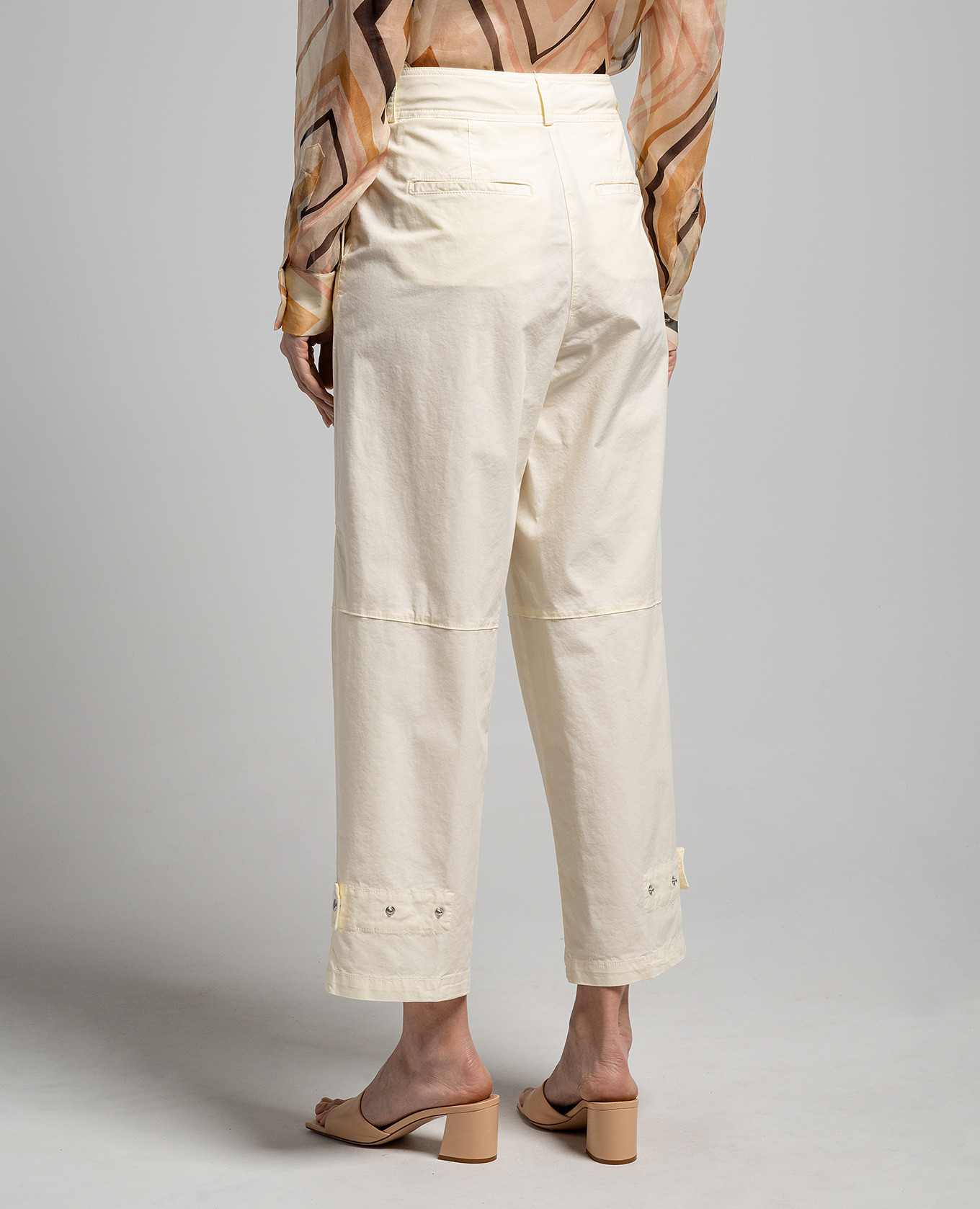 

Yellow pants with a brand patch Peserico
