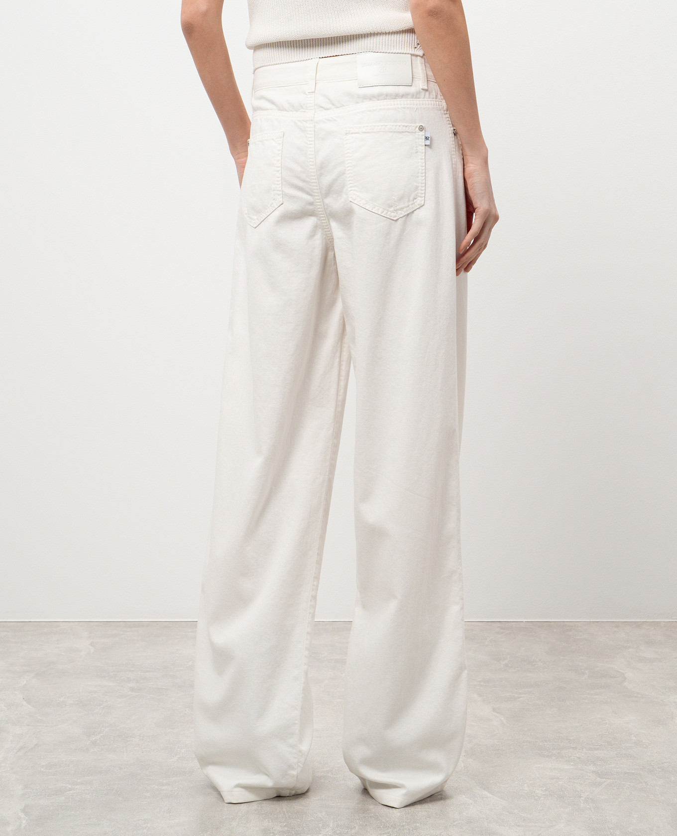 

White jeans with leather logo patch Ermanno Scervino
