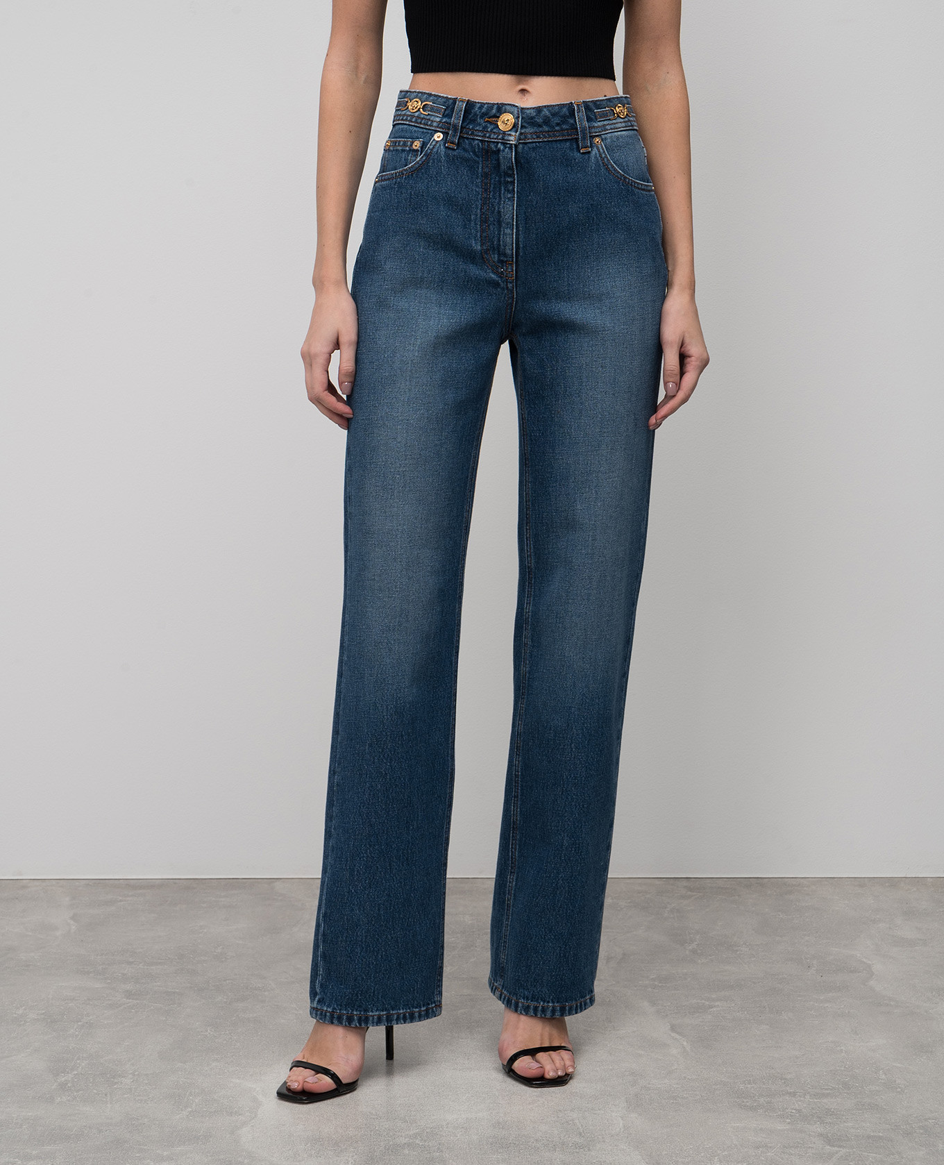 

Blue jeans with a worn effect Versace