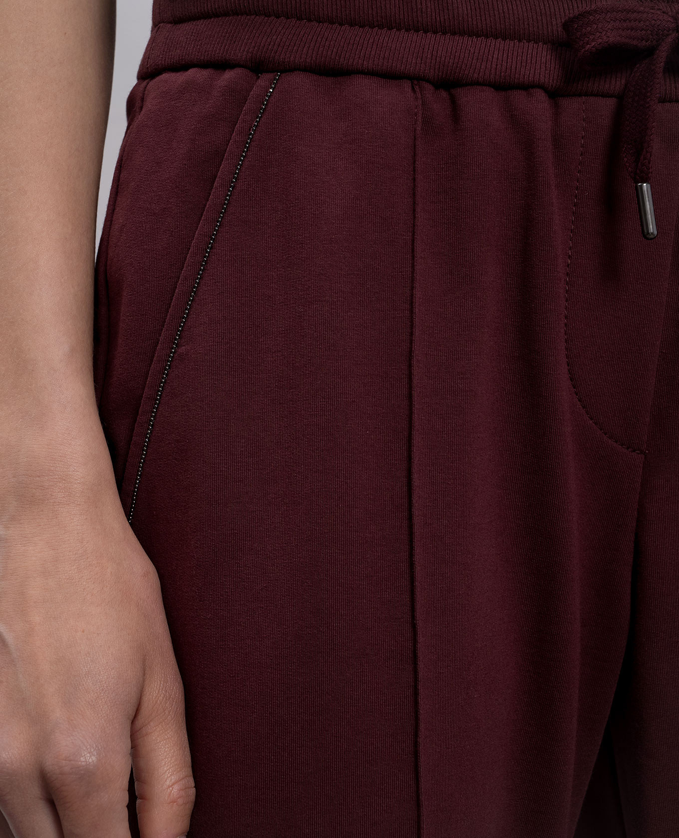

Burgundy sweatpants with monil chain Brunello Cucinelli