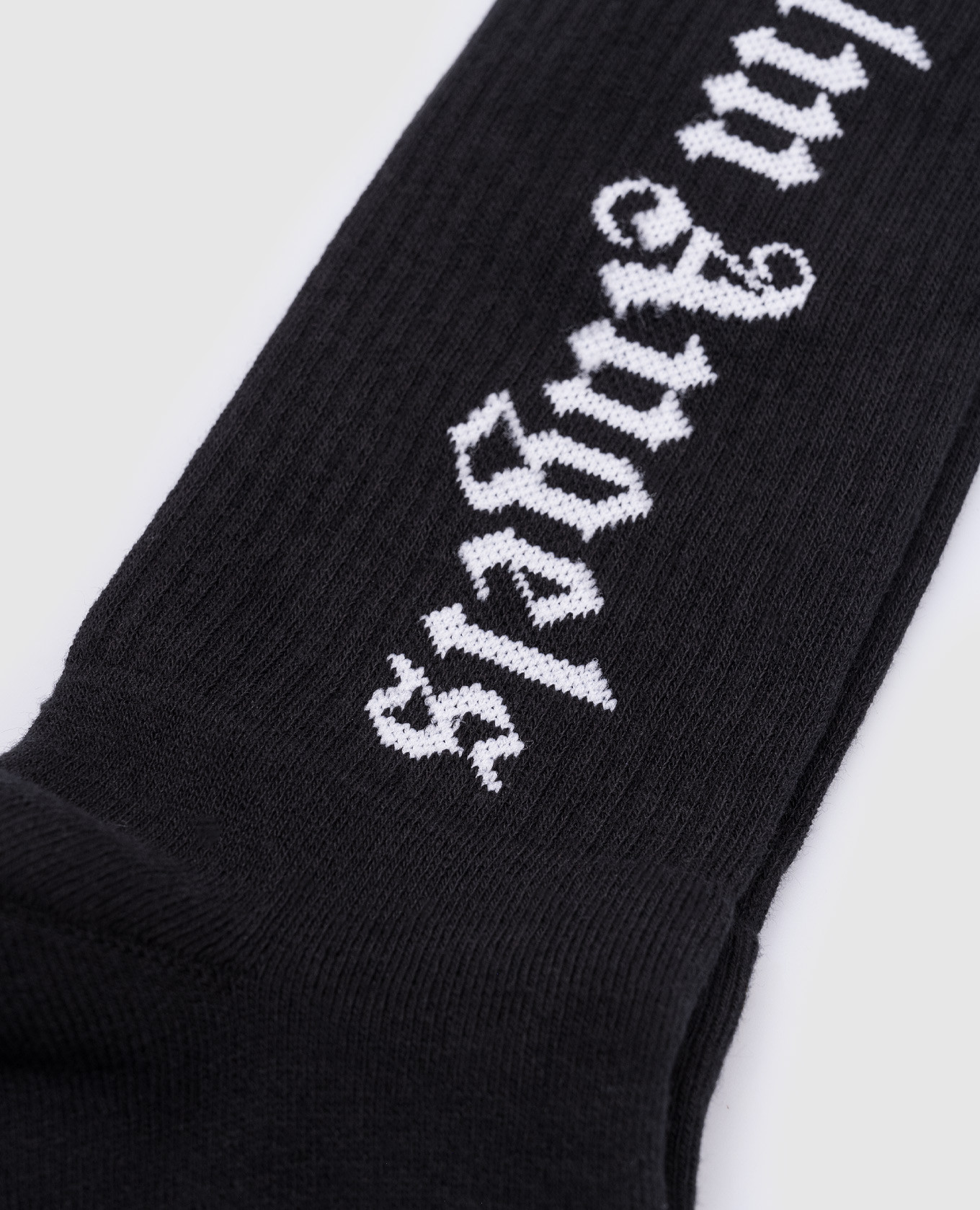 

Black socks with a logo pattern Palm Angels