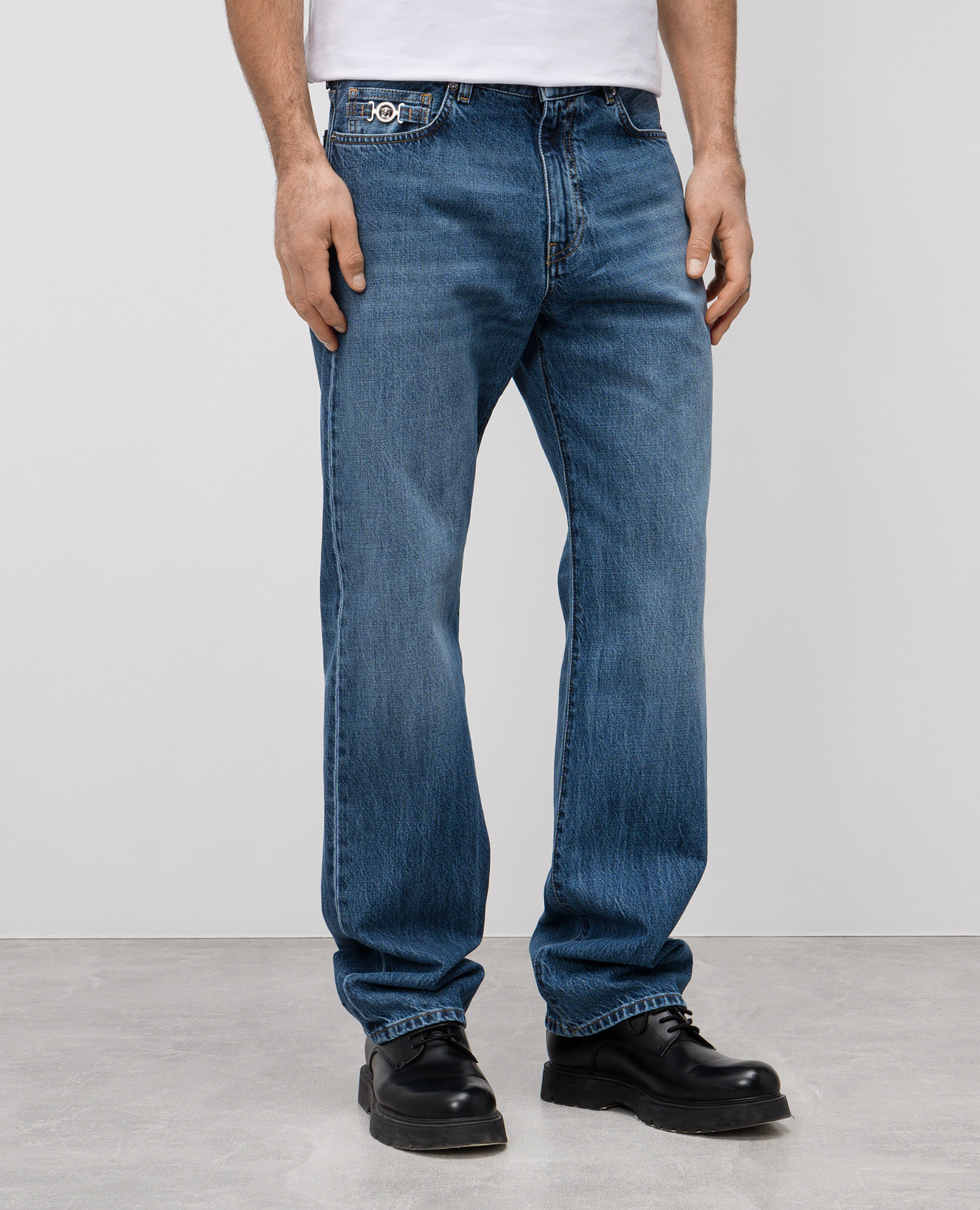 Blue jeans with leather logo patch Versace 3