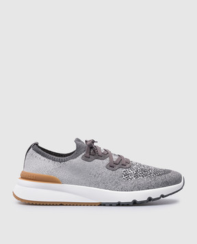 Brunello Cucinelli Gray sneakers with leather inserts with a textured logo MZUKISO250