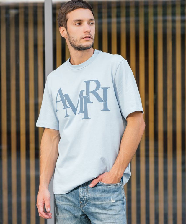 AMIRI - Straggered logo print t-shirt in blue AMJYTE1078