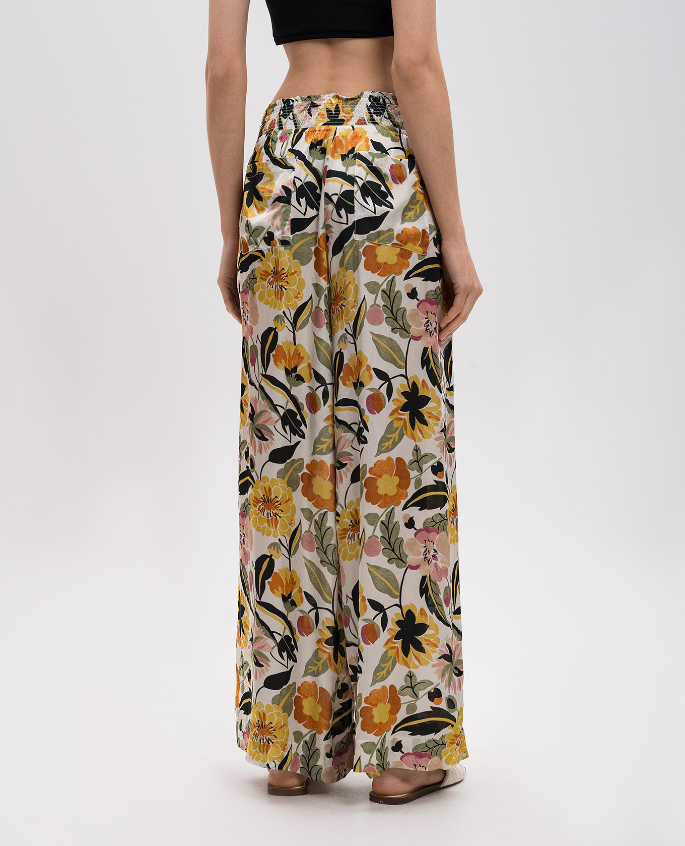 

Floral print pants byTimo, White
