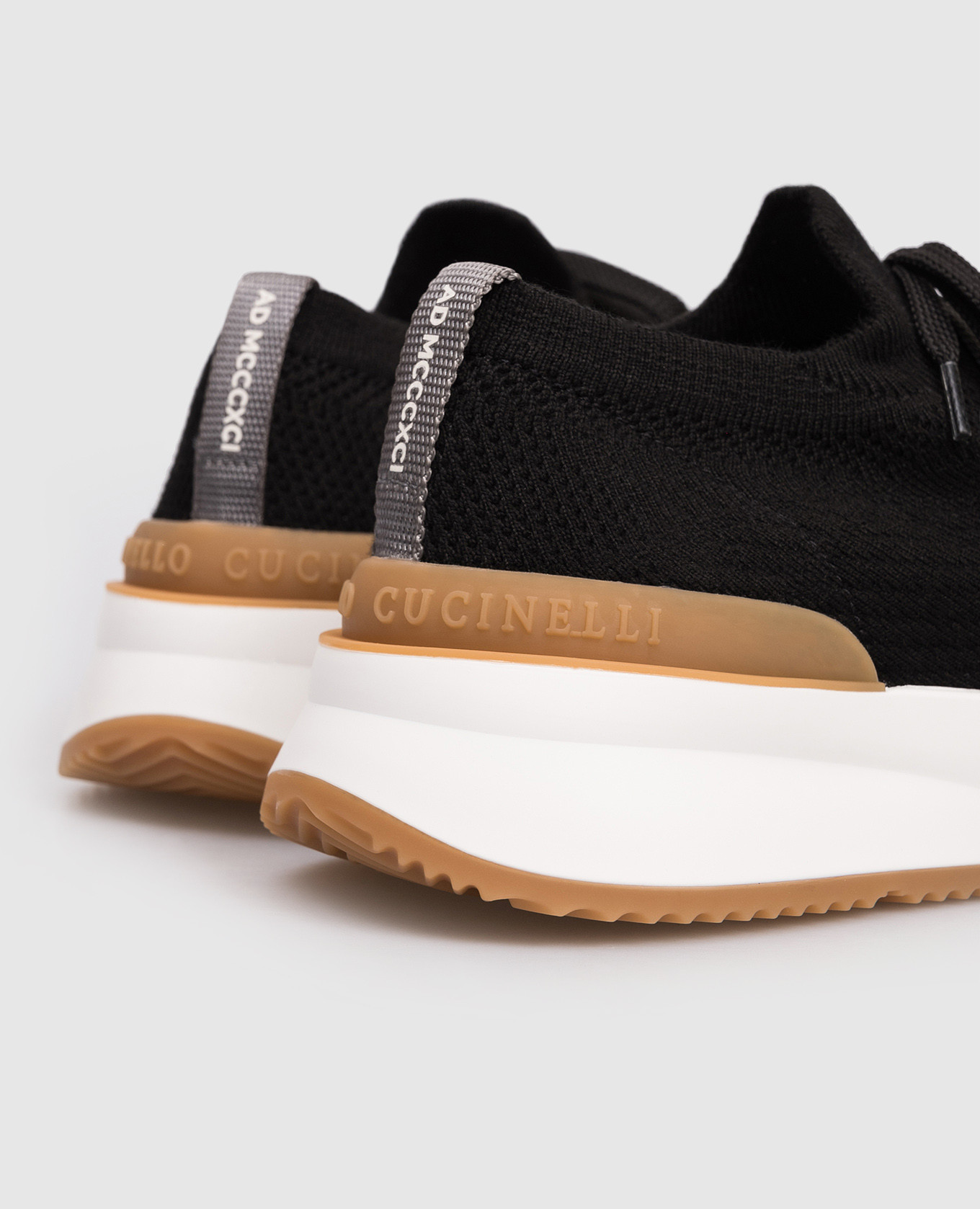 

Black sneakers with textured logo Brunello Cucinelli