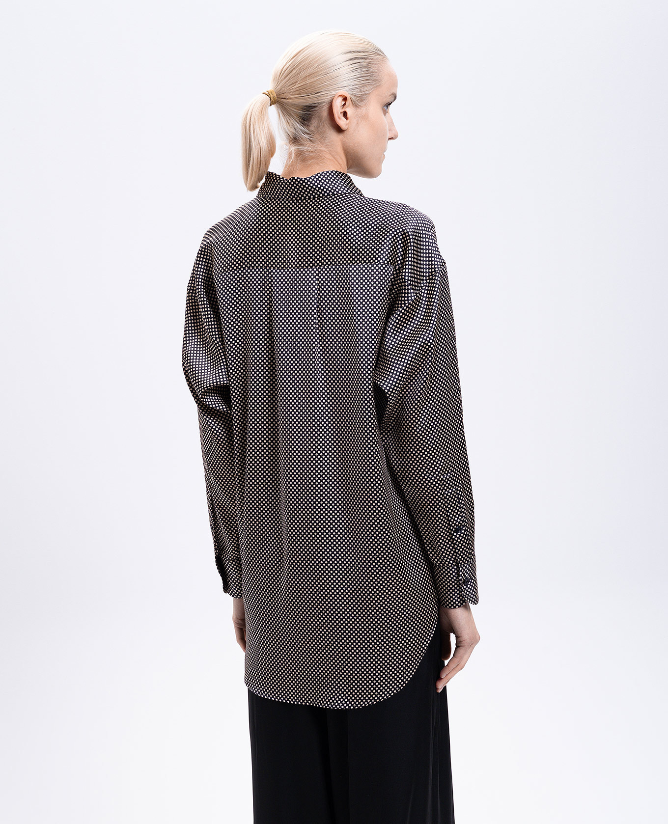 

Black elongated blouse made of polka dot silk Tom Ford