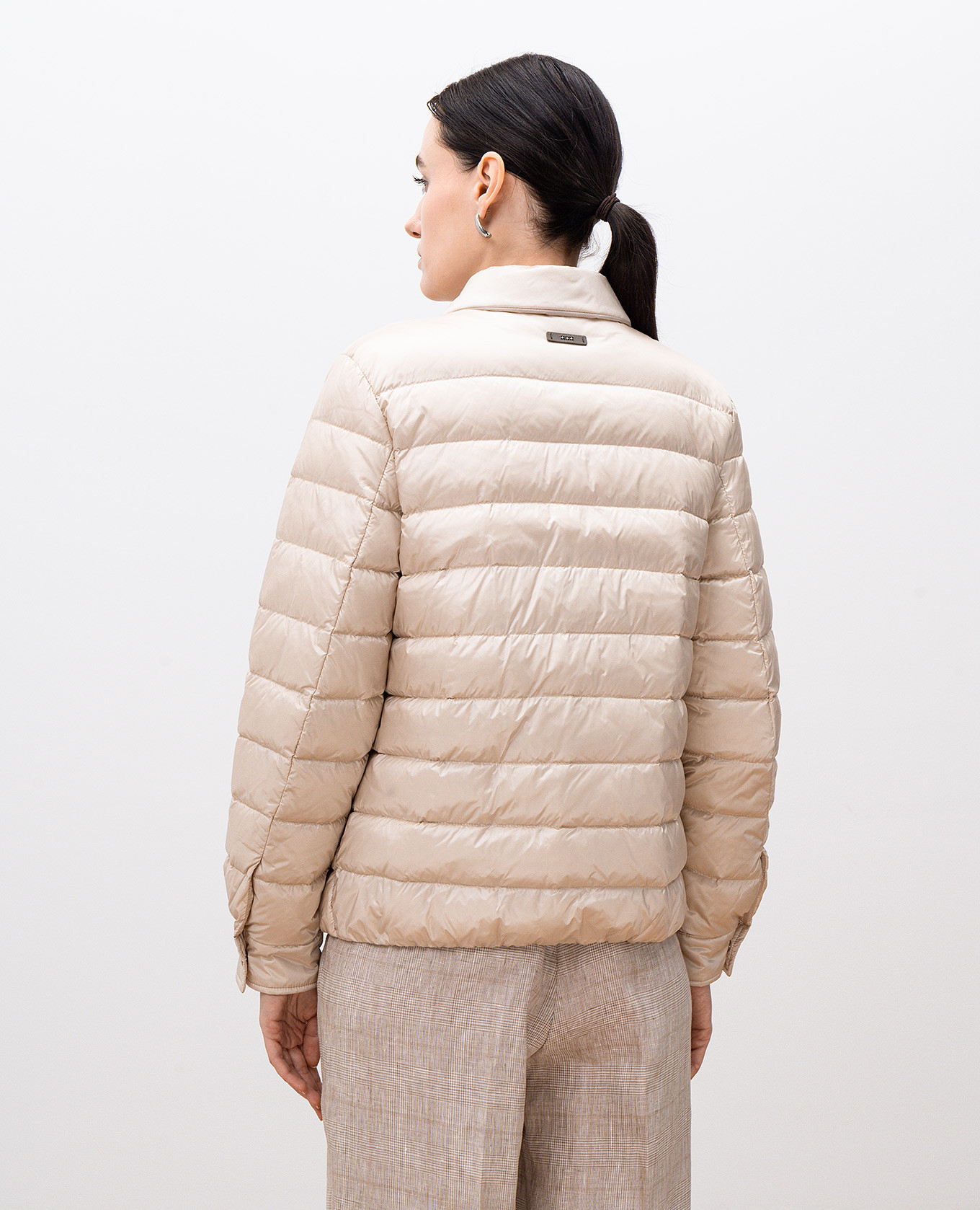 

Beige quilted down jacket with monil chain and branded patch Peserico