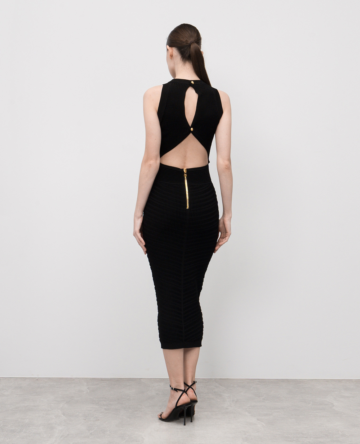 

Black midi dress with figure-hugging necklines Balmain