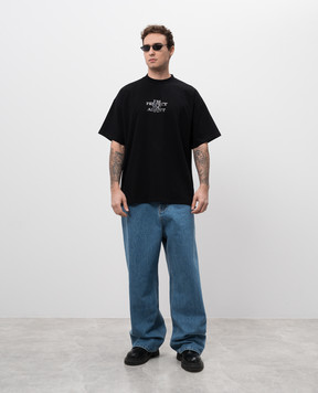 Vetements Blue jeans with logo patch UA66PA540Nm