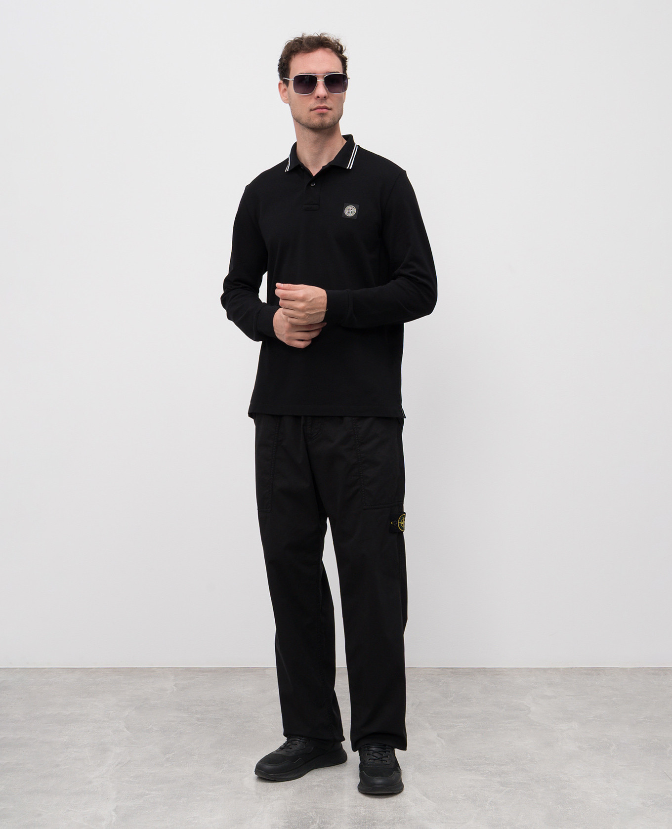 

Black polo shirt with logo patch Stone Island