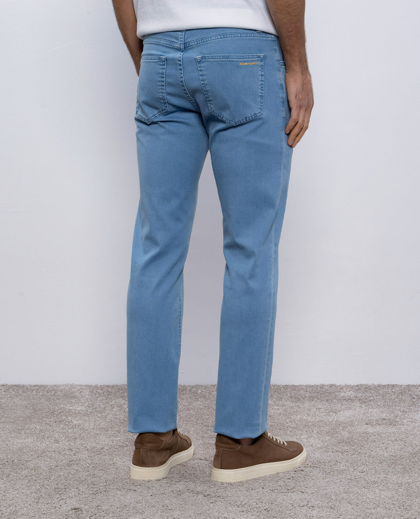 

Blue jeans with leather logo patch Stefano Ricci, Light blue