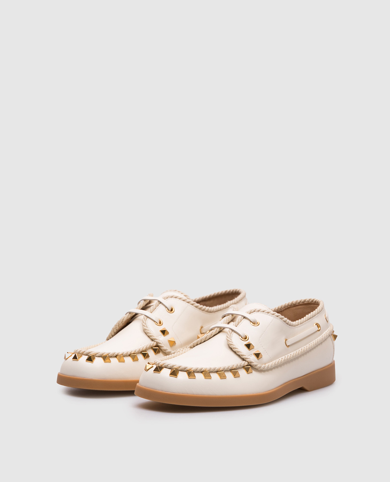 

Beige Rockstud leather topsiders Valentino