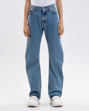 Vetements Blue jeans with logo patch UH76DP400LB3w