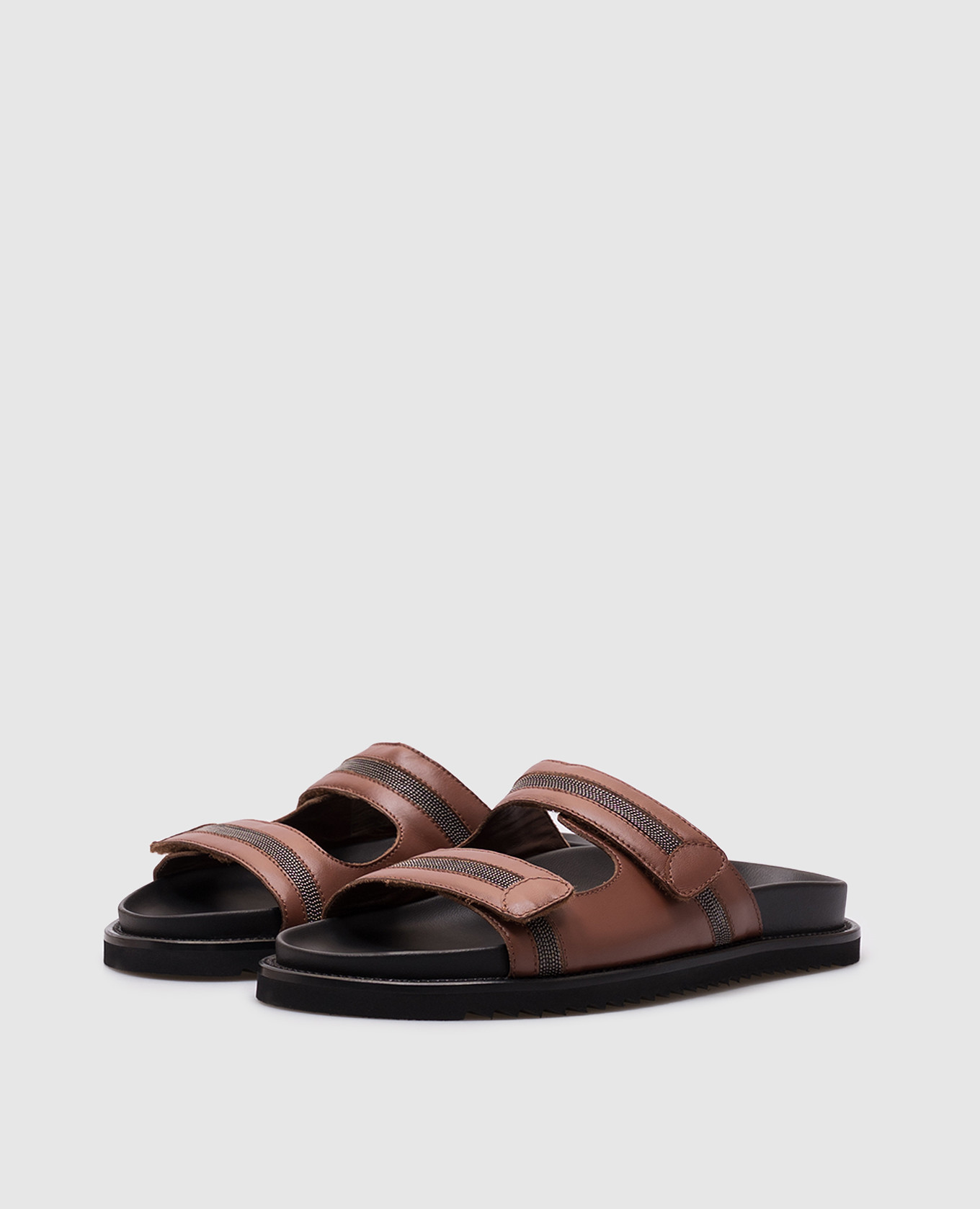 

Brown leather flip-flops with a monil chain Doucal's