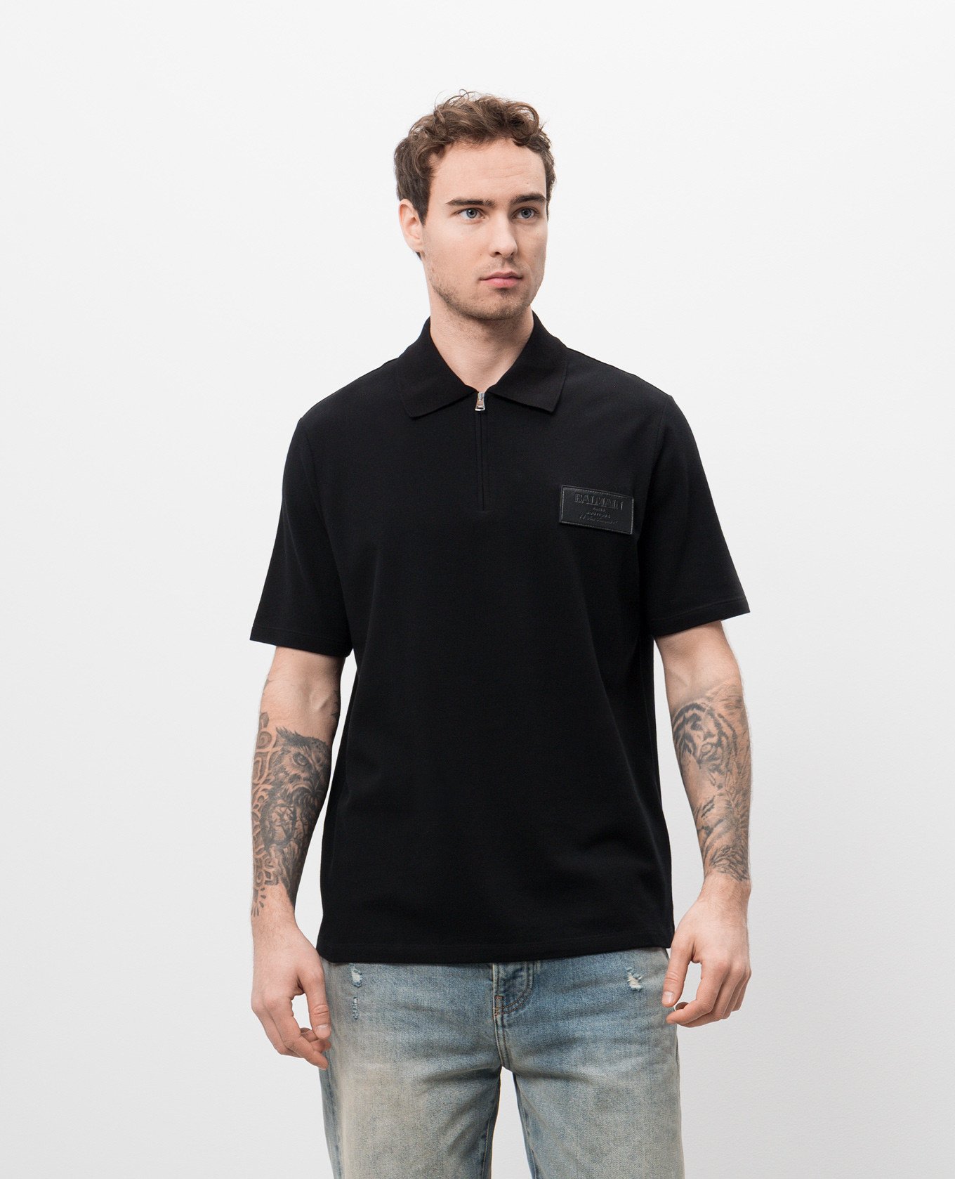 

Black polo with logo patch Balmain