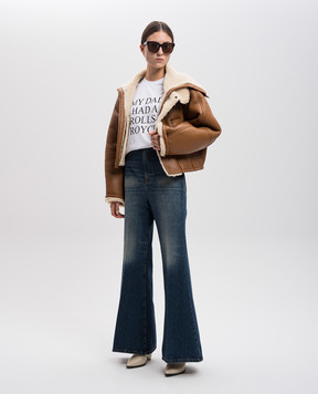 Victoria Beckham Blue flared jeans with leather logo patch 1424DJE005881A