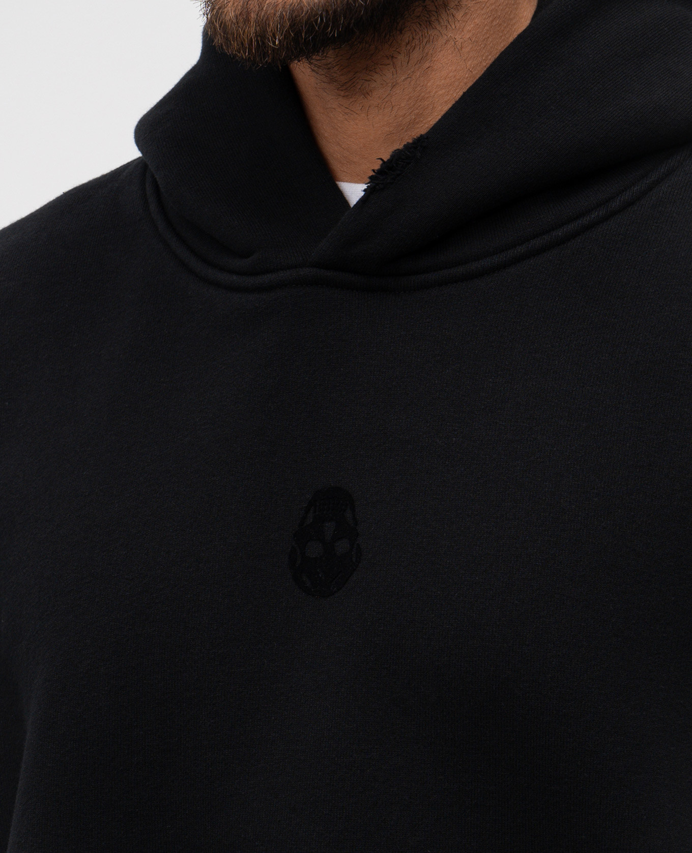 

Blue hoodie with textured logo emblem Alexander McQueen