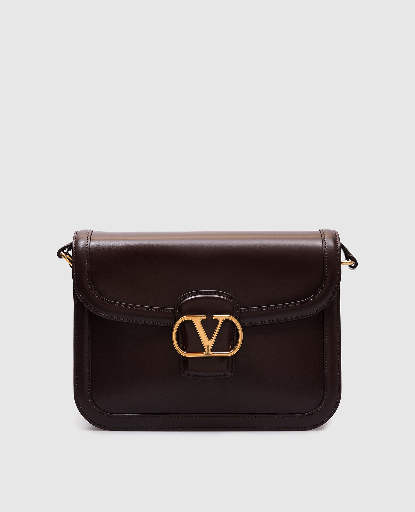 

Brown glossy leather messenger bag with logo Valentino