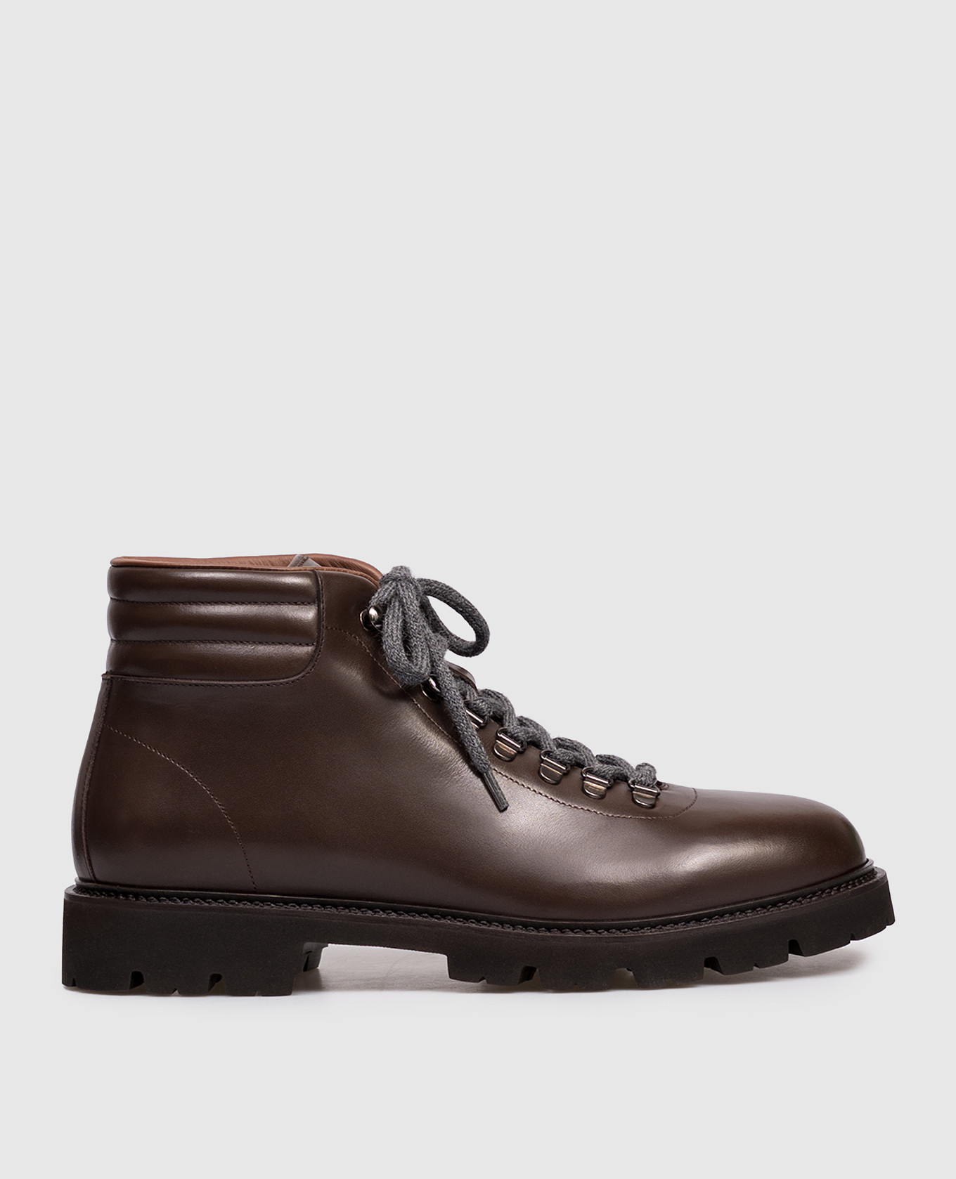 

Brown leather boots with emblem Peserico