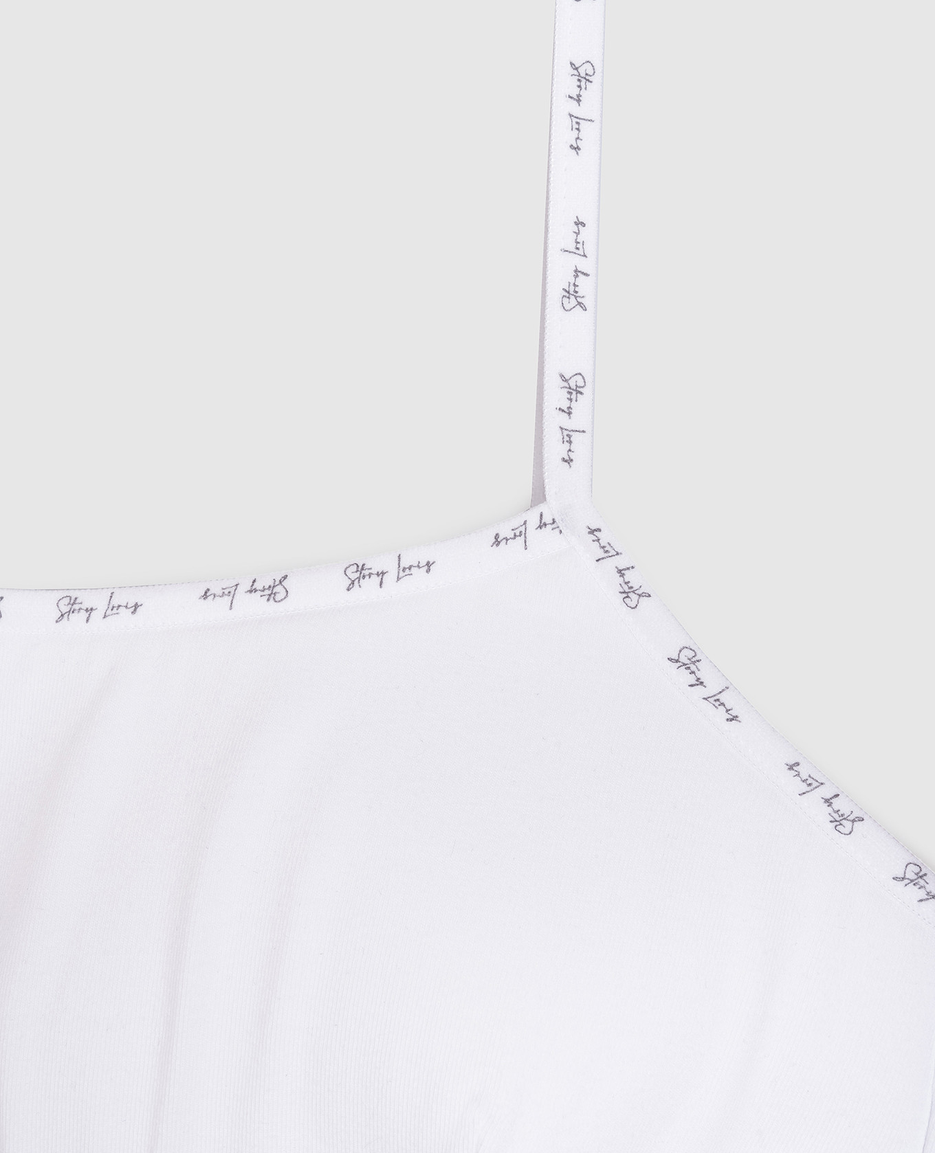 

Children's white top with branded edging Story Loris
