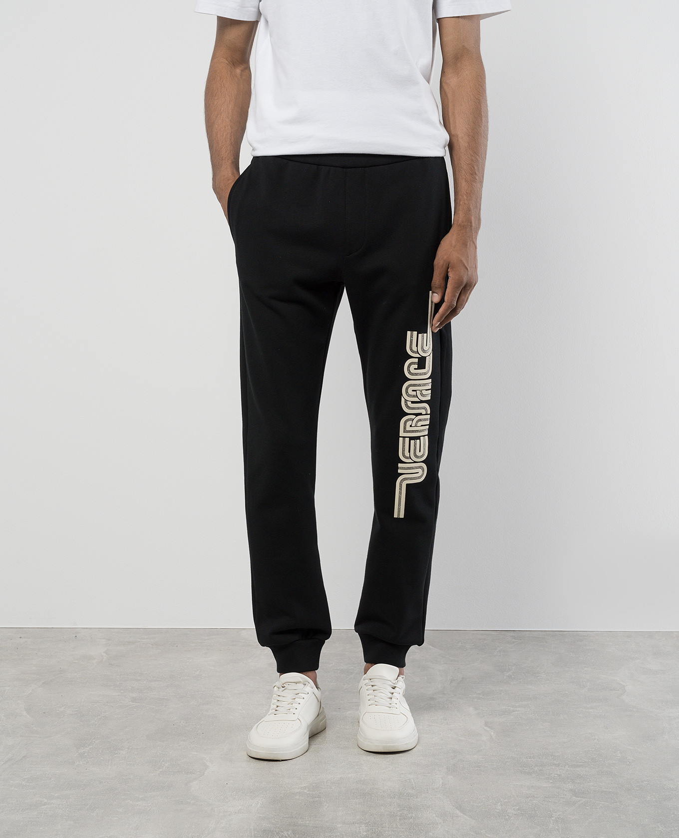 Black joggers with textured logo print Versace 3