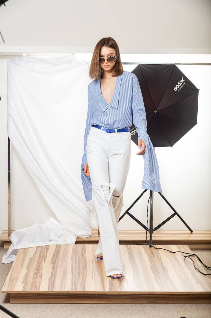 

White flared jeans with slits Coperni