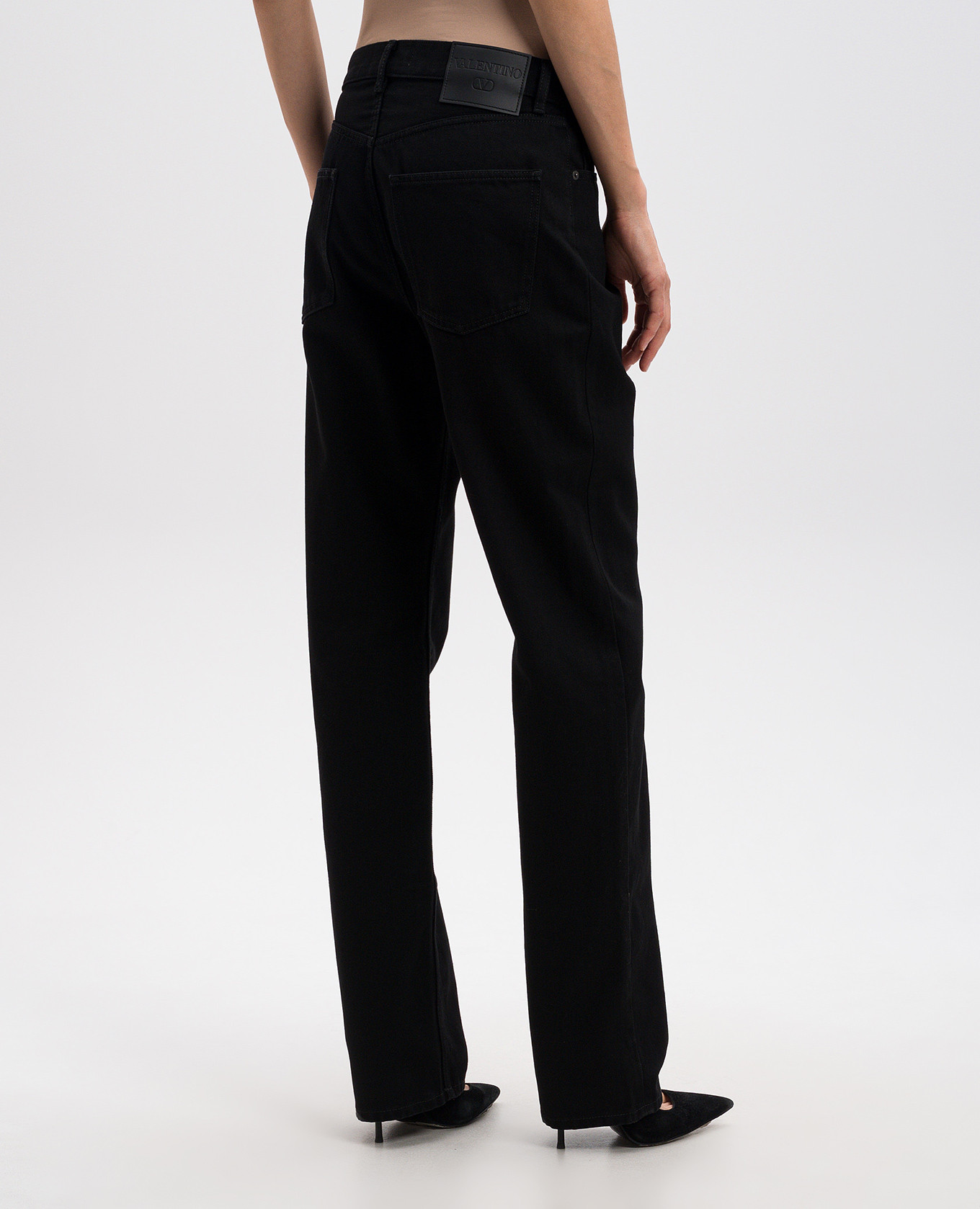 Black jeans with leather logo patch Valentino 4