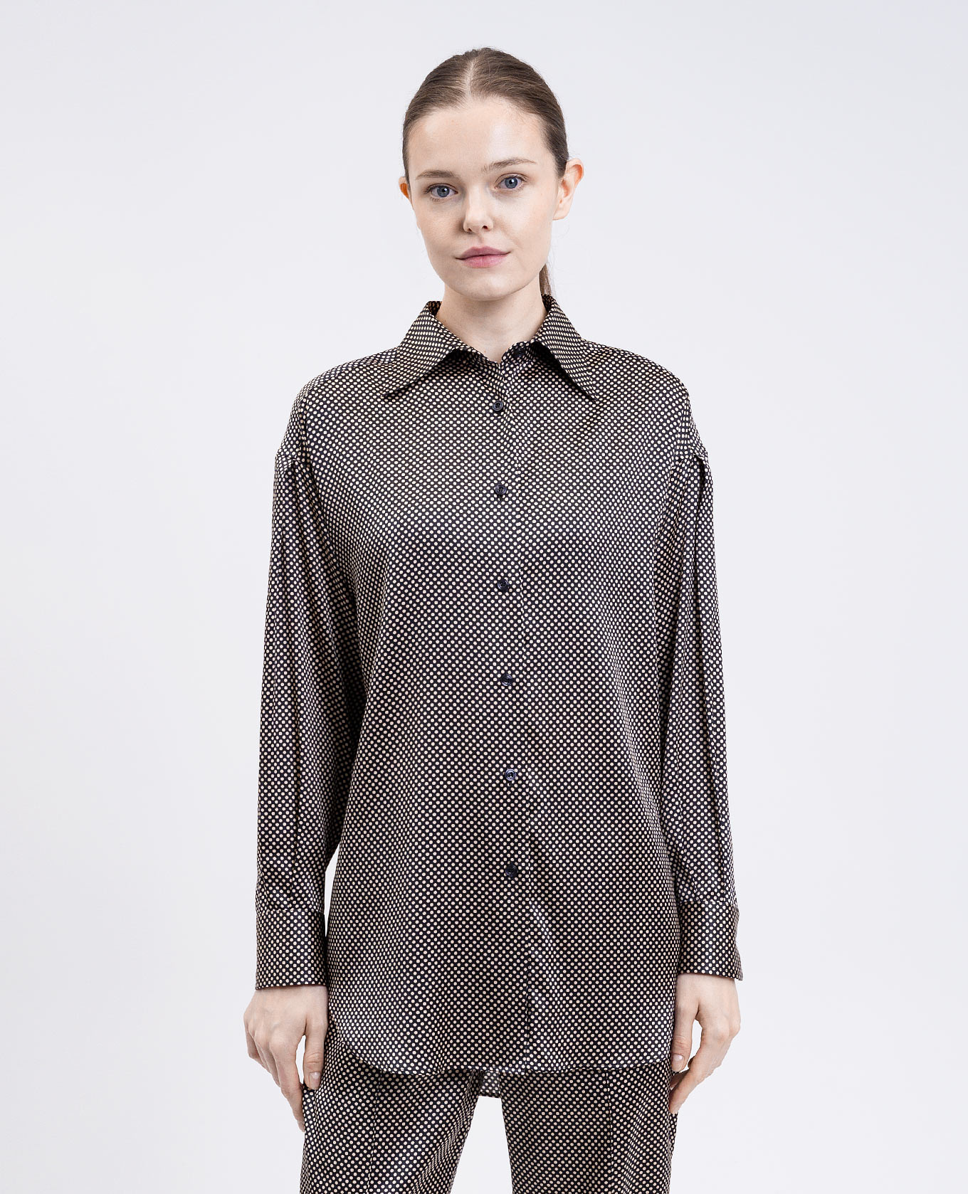 

Black elongated blouse made of polka dot silk Tom Ford