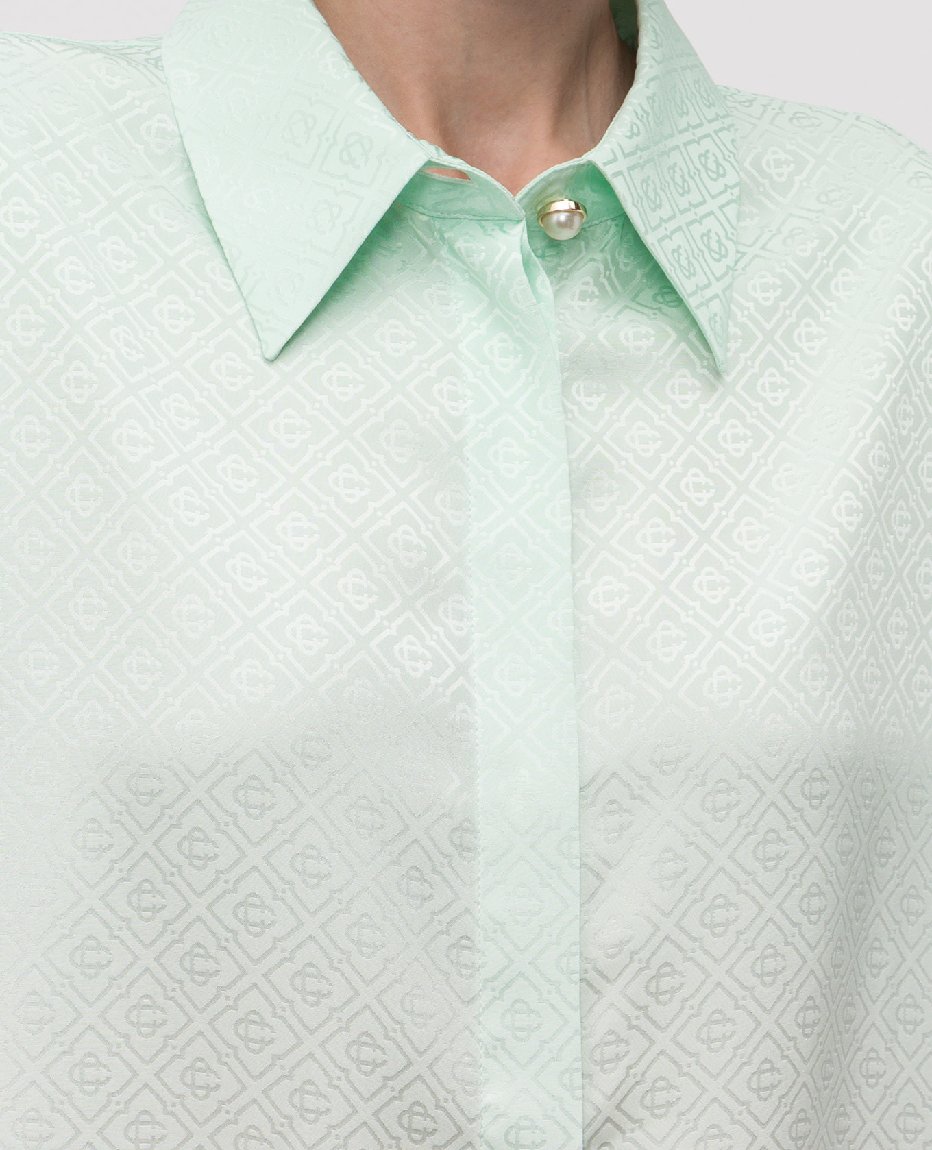

Green blouse with emblem pattern Casablanca