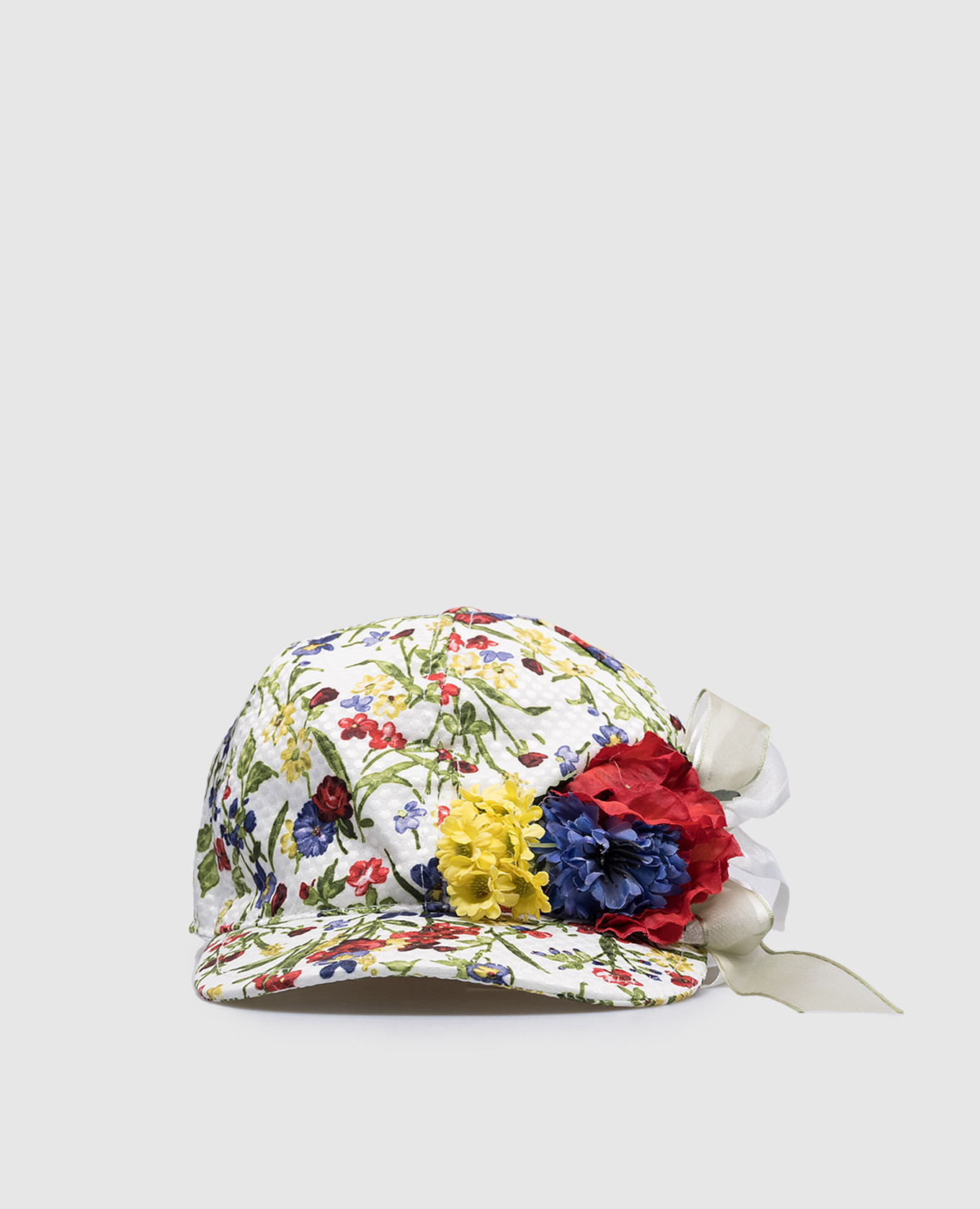 Children's white cap in a floral print il trenino