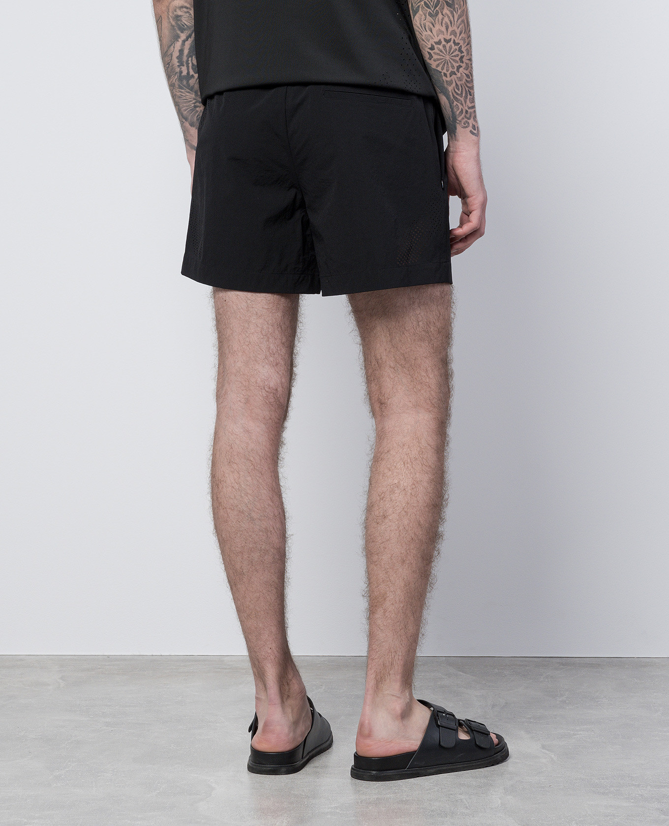 Intine black swim shorts with perforations Heliot Emil 4