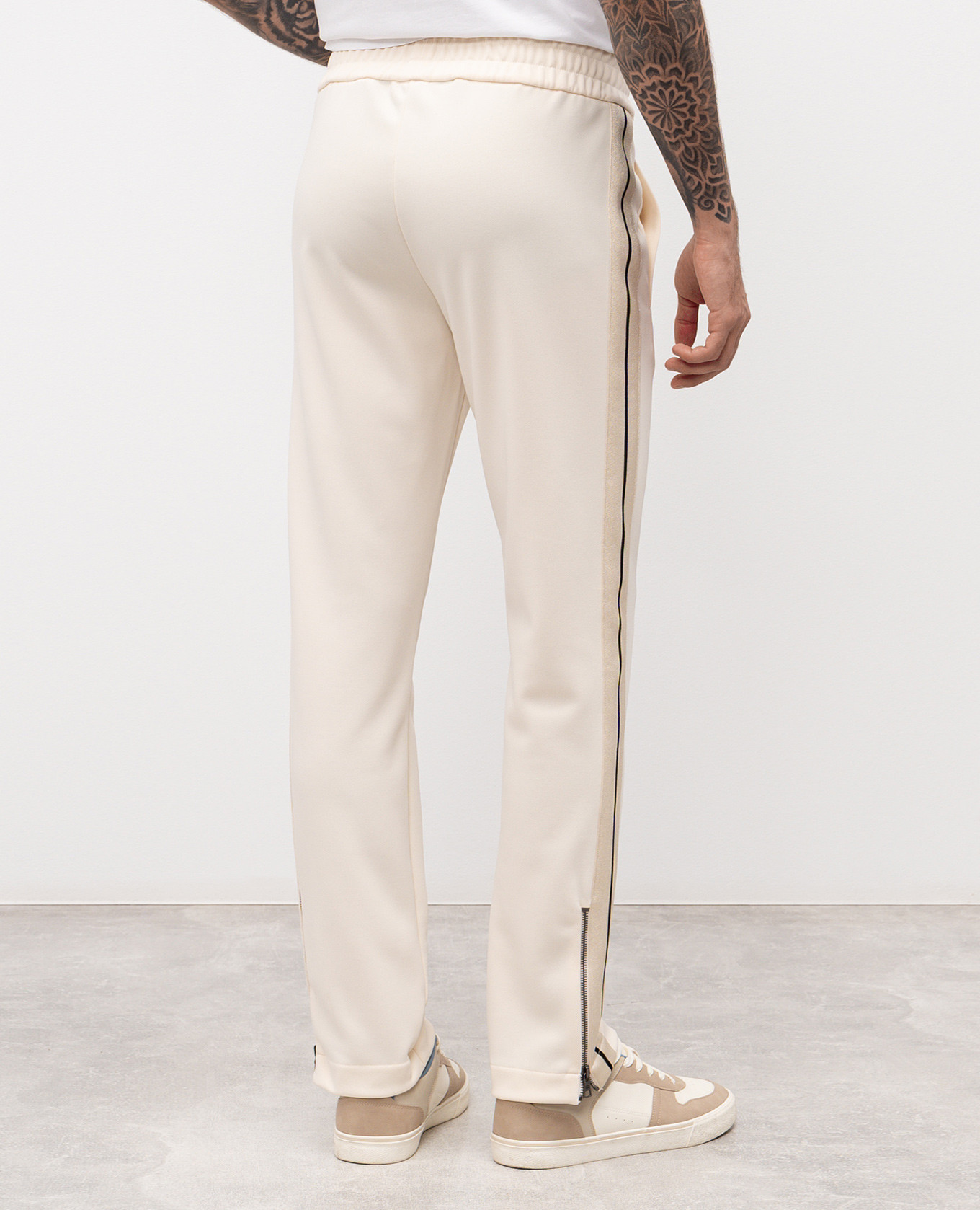 

Beige sweatpants with logo embroidery Palm Angels