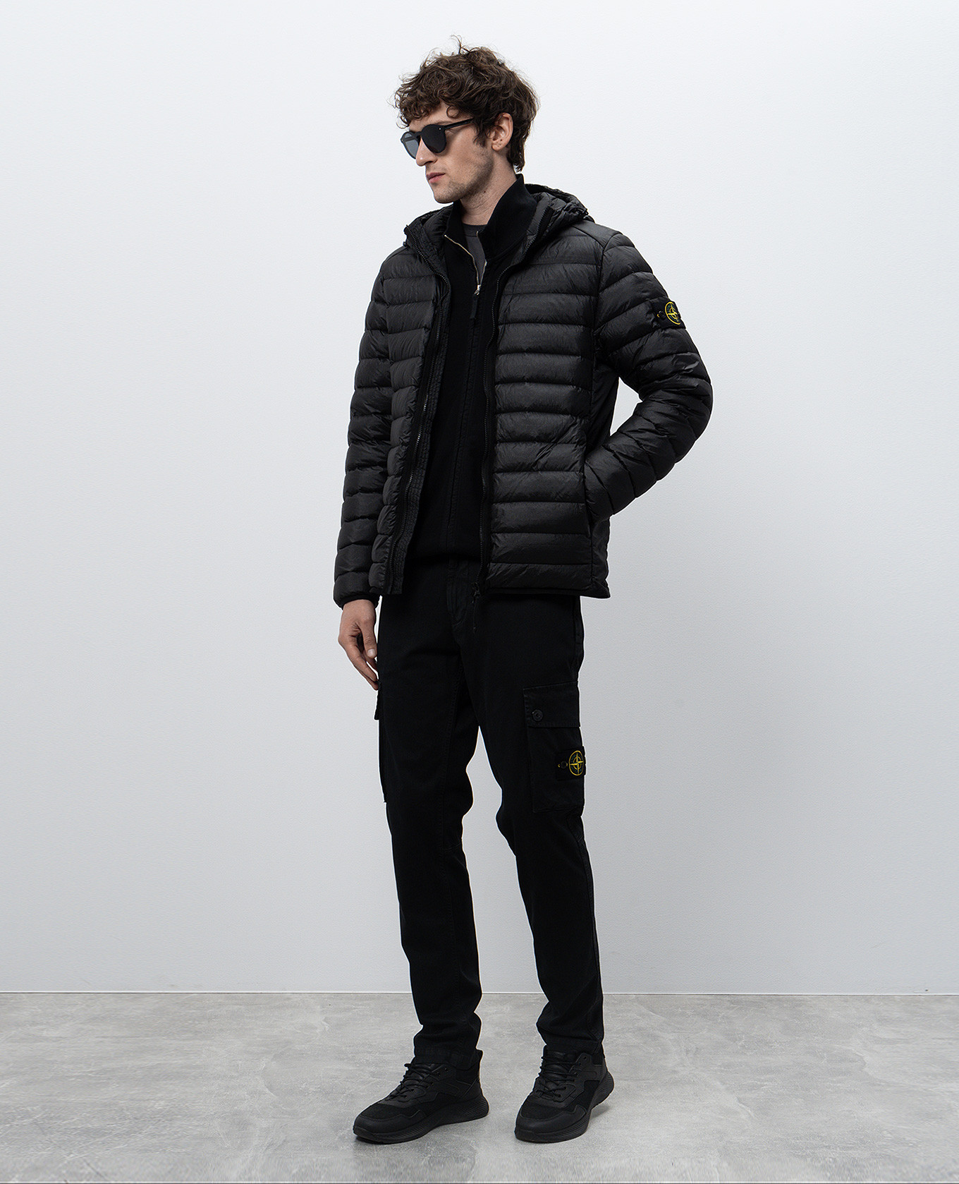 

Black cargo pants with logo patch Stone Island