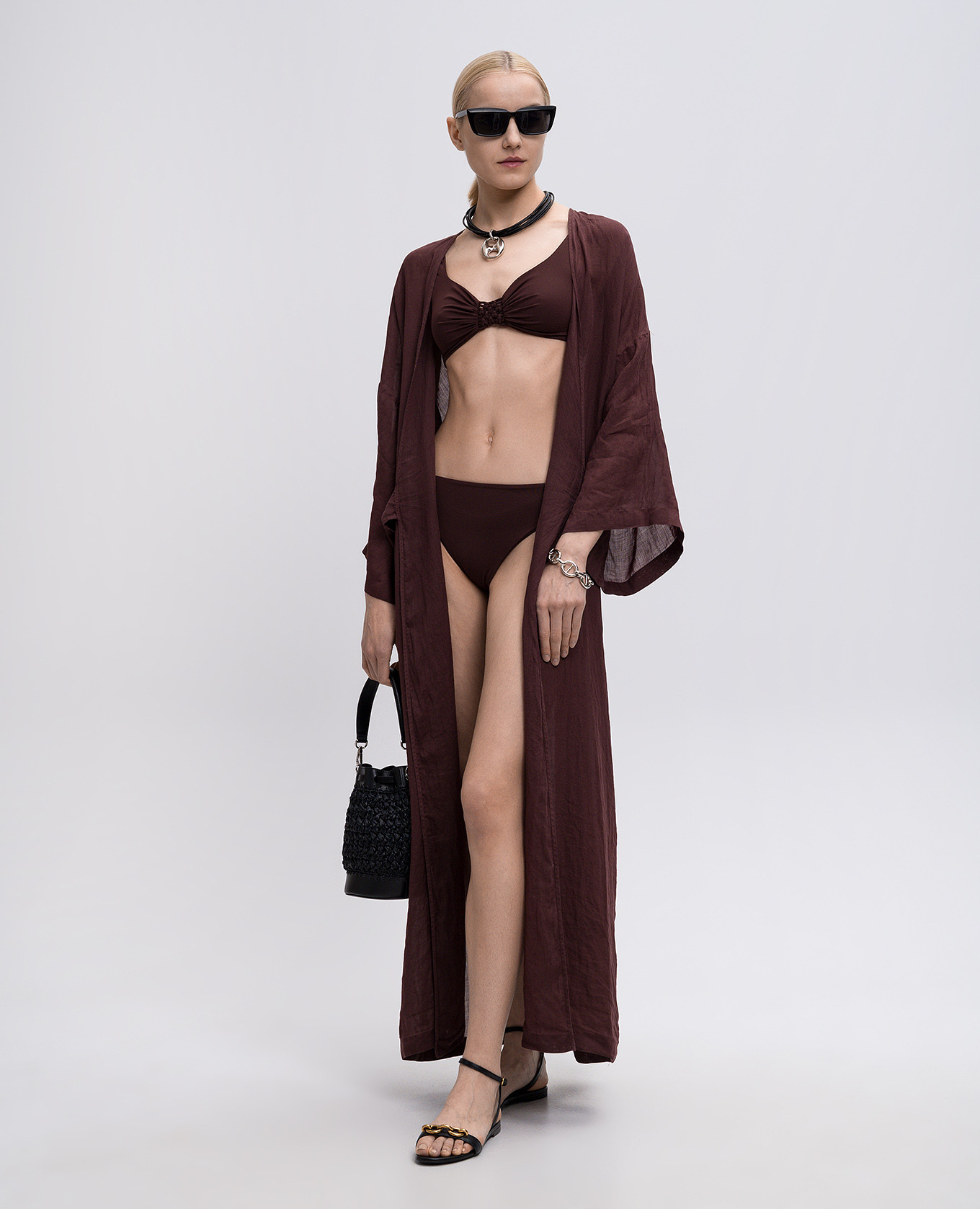 

Brown swimsuit panties with braiding Fisico