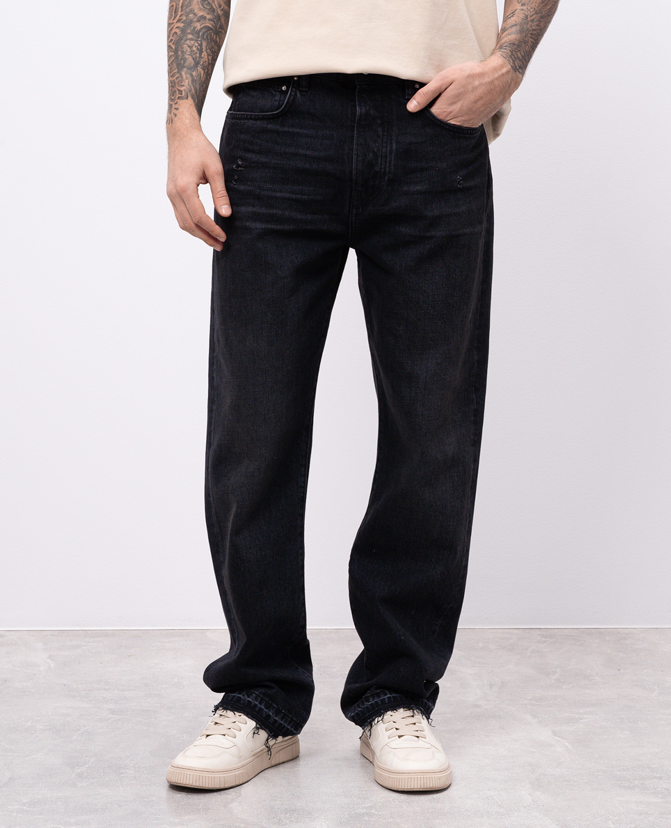

Black jeans with logo patch AMIRI