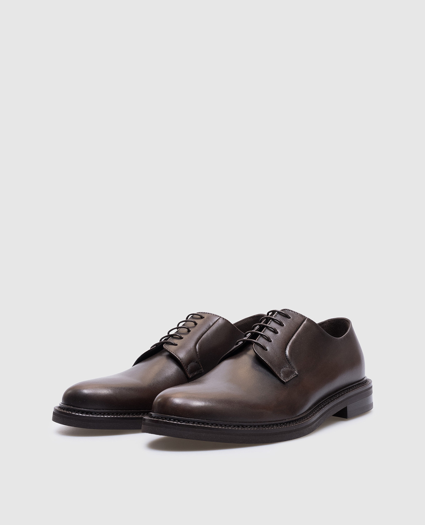 

Brown leather derbies with embossed logo Peserico