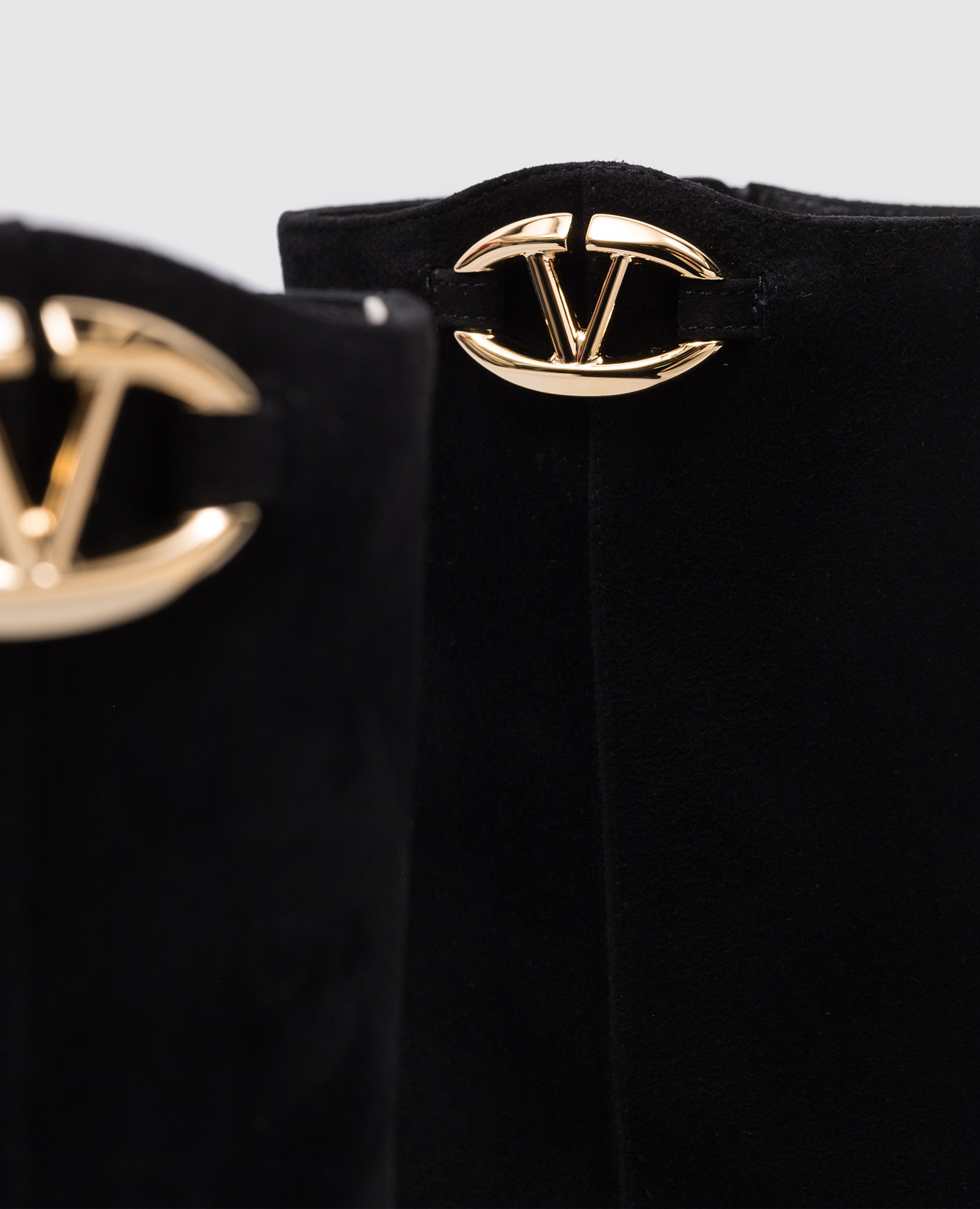 

TAN-GO black suede ankle boots with metallic logo Valentino