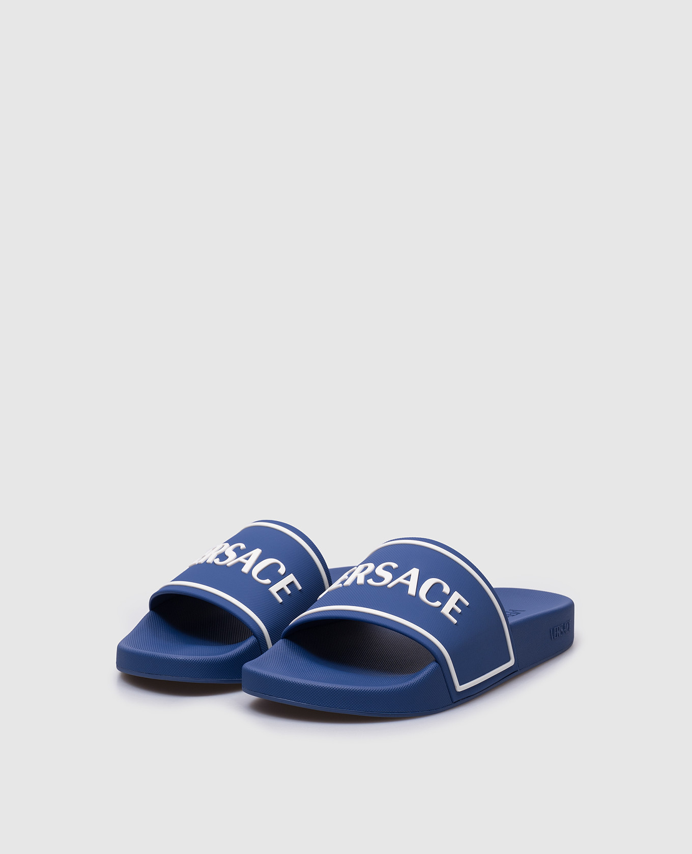 

Blue sliders with textured logo Versace
