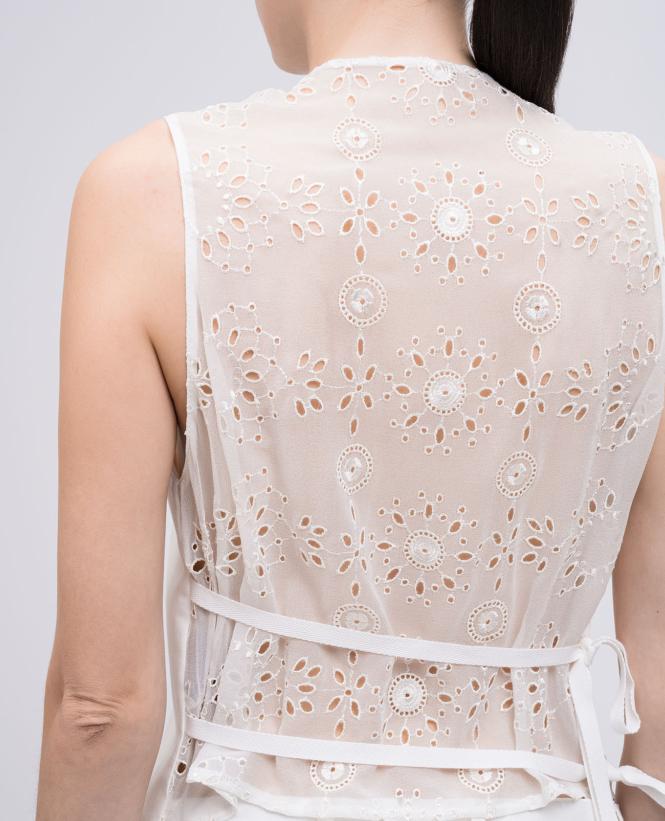 

Tiuku white vest with silk Ann Demeulemeester