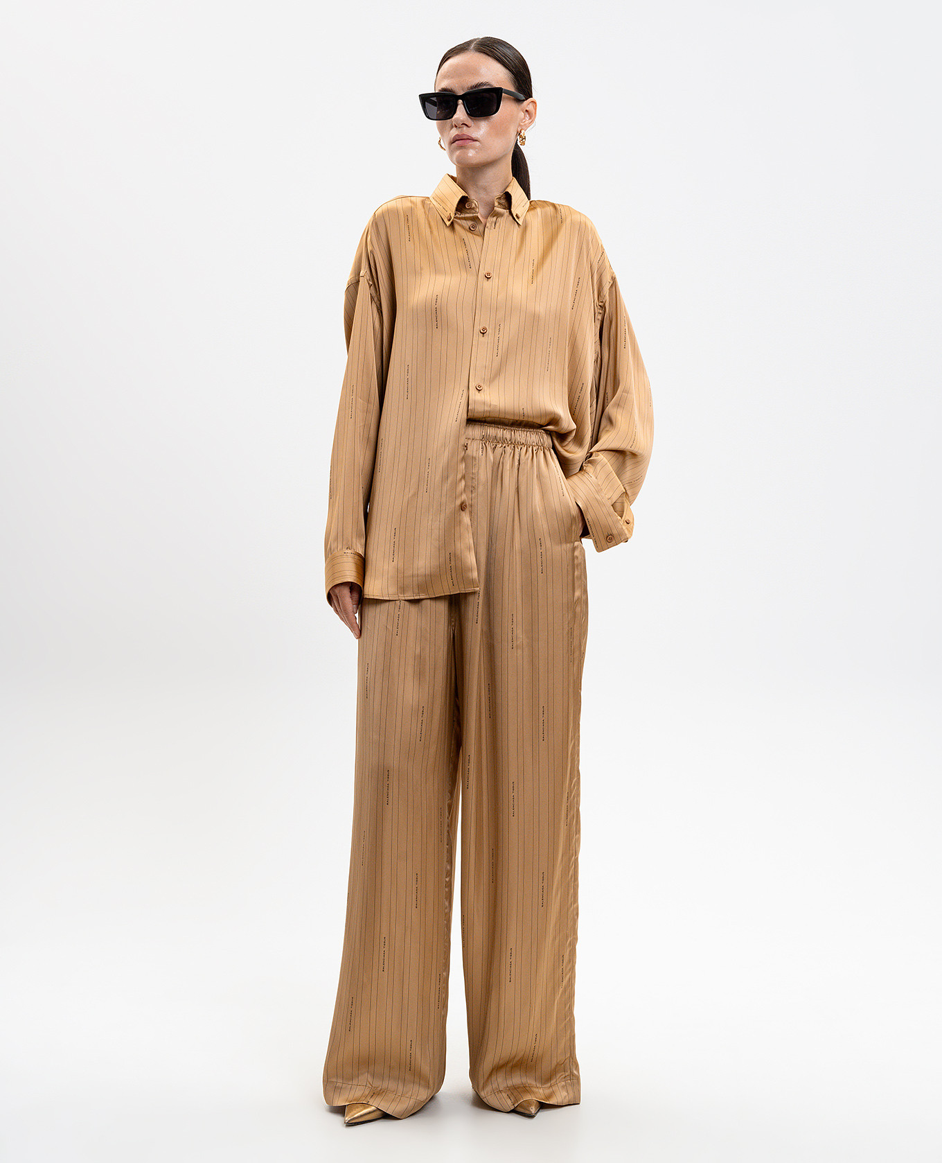 

Beige striped pants with logo print Balenciaga