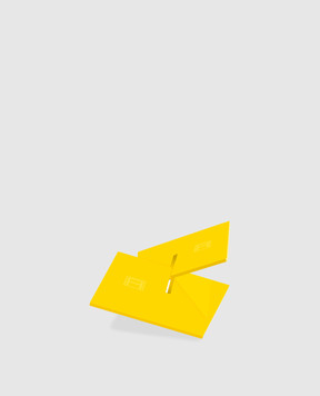 Assouline Yellow book stand ABOOKSTAND